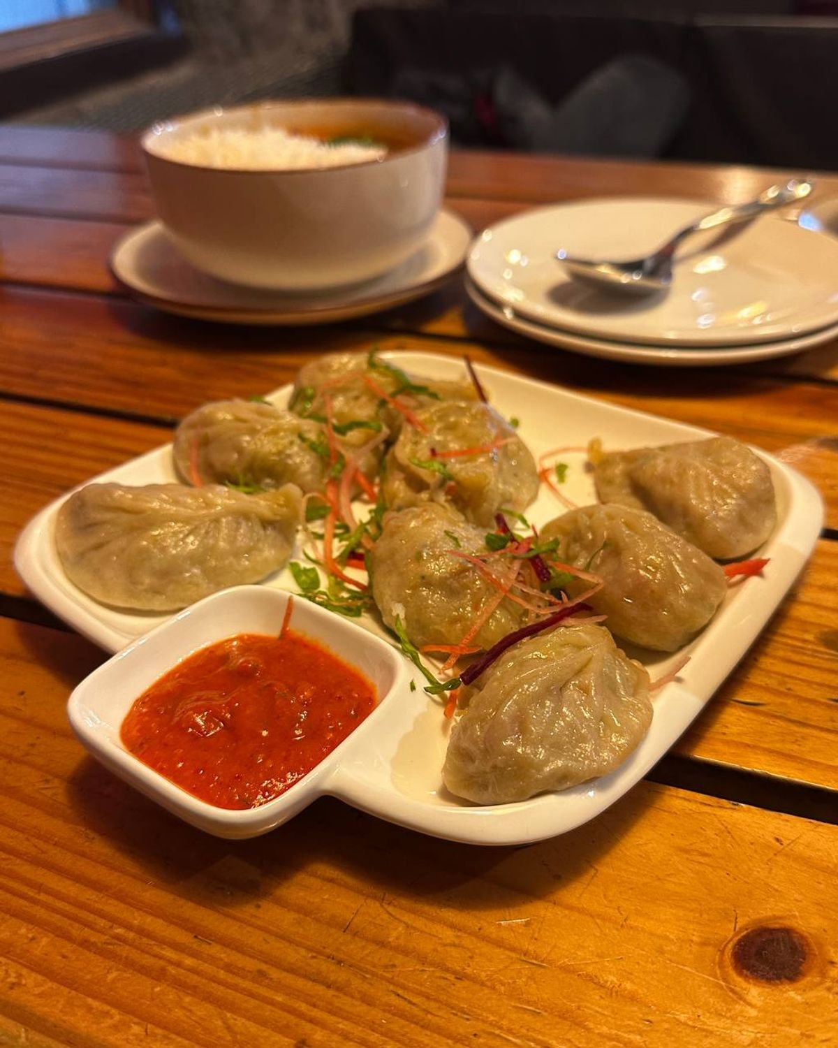 Steamed Tibetan momos with spicy chutney