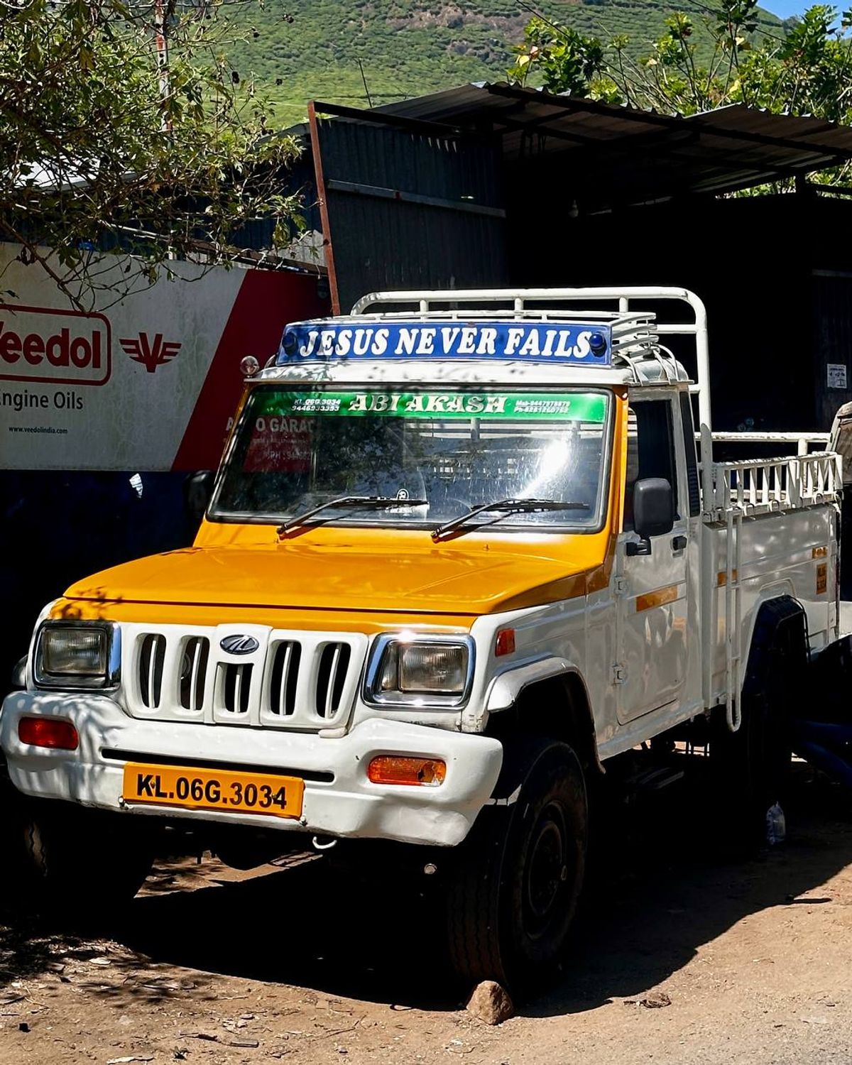 Indian truck with Jesus Never Fails painted on top