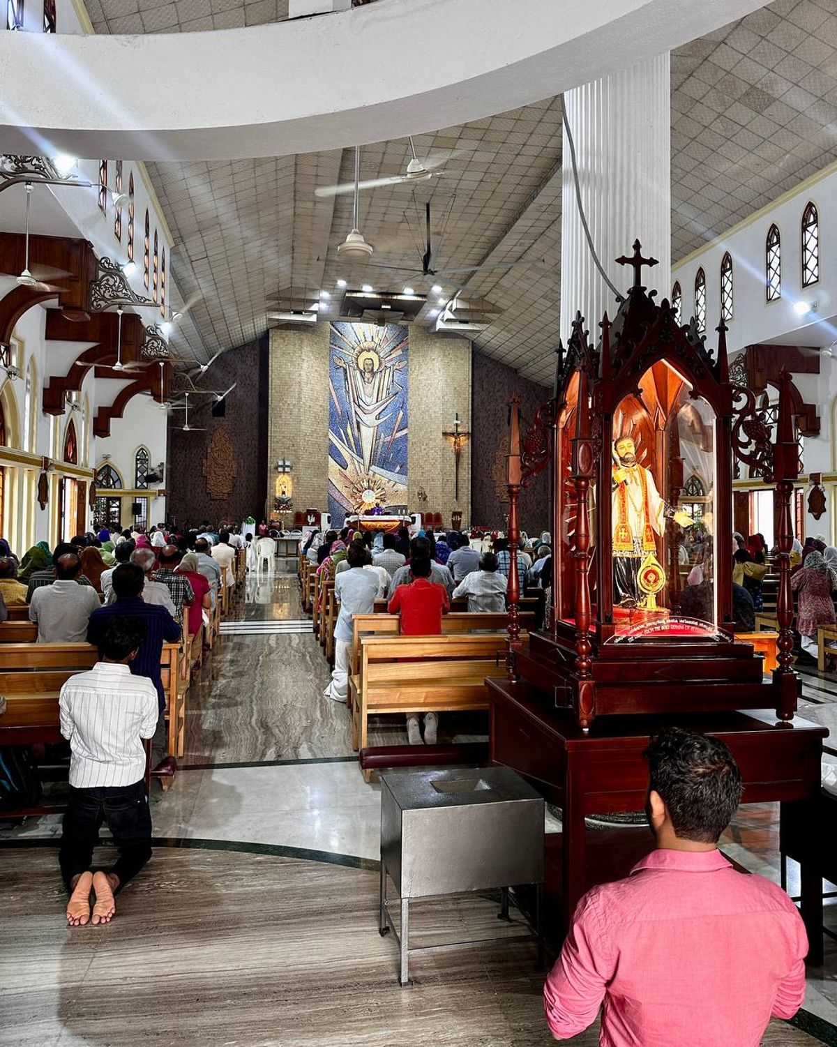 Congregation during Mass in a Kerala church