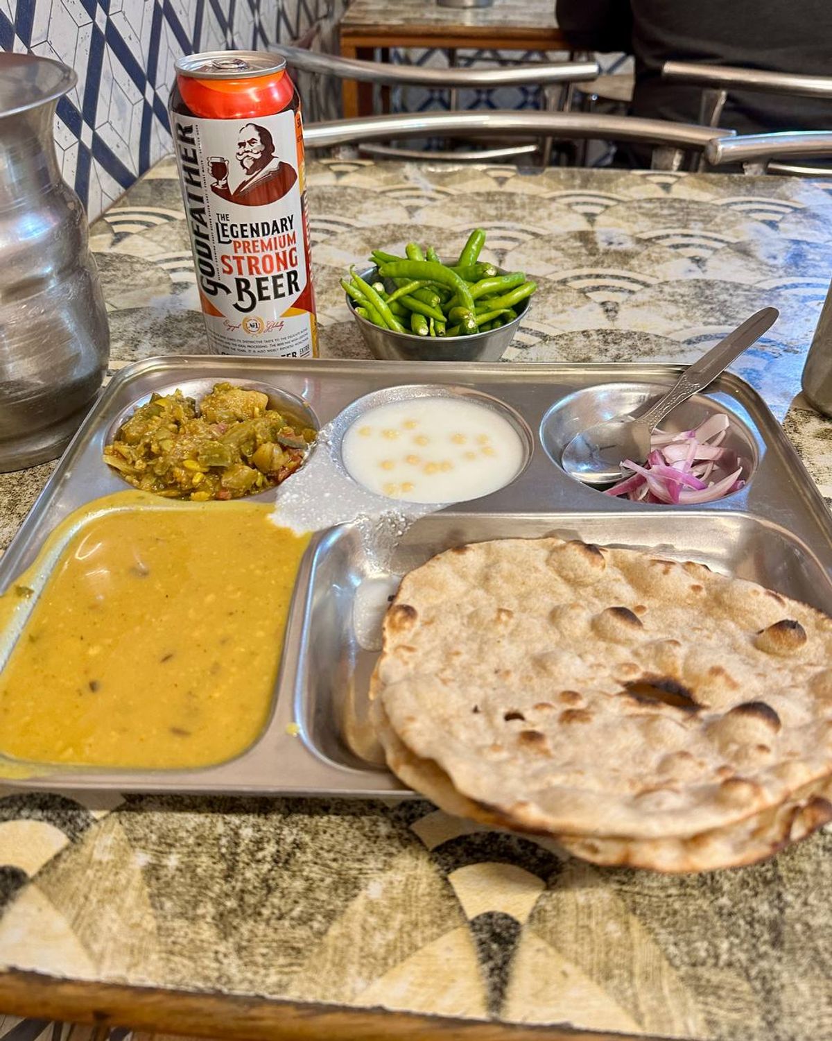 Simple dhaba thali with green chilies