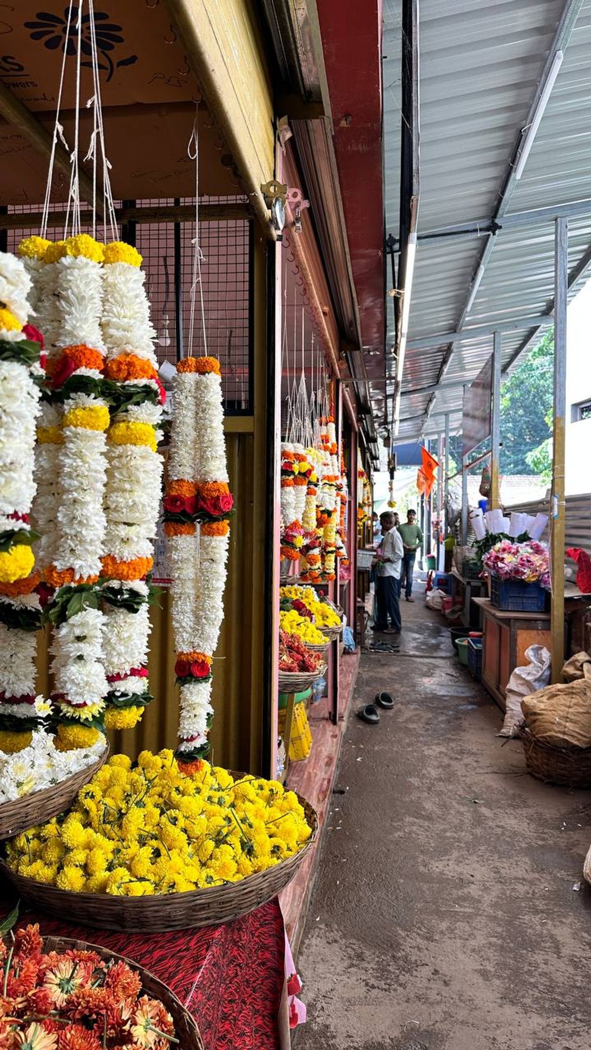Flower garlands and marigolds at temple market