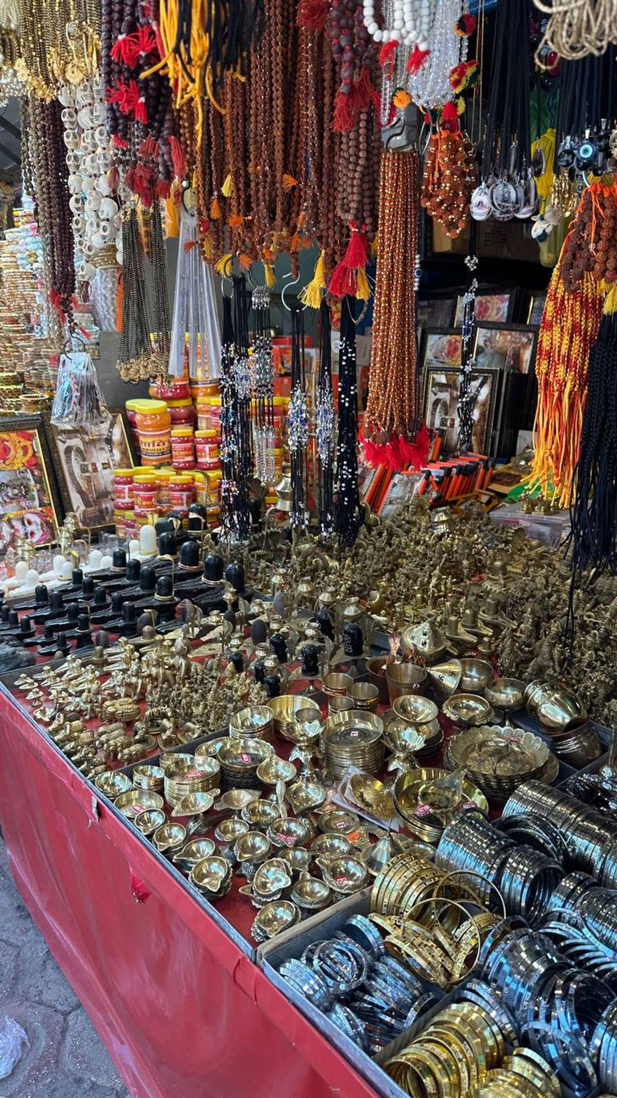 Brass items, prayer beads, and religious souvenirs