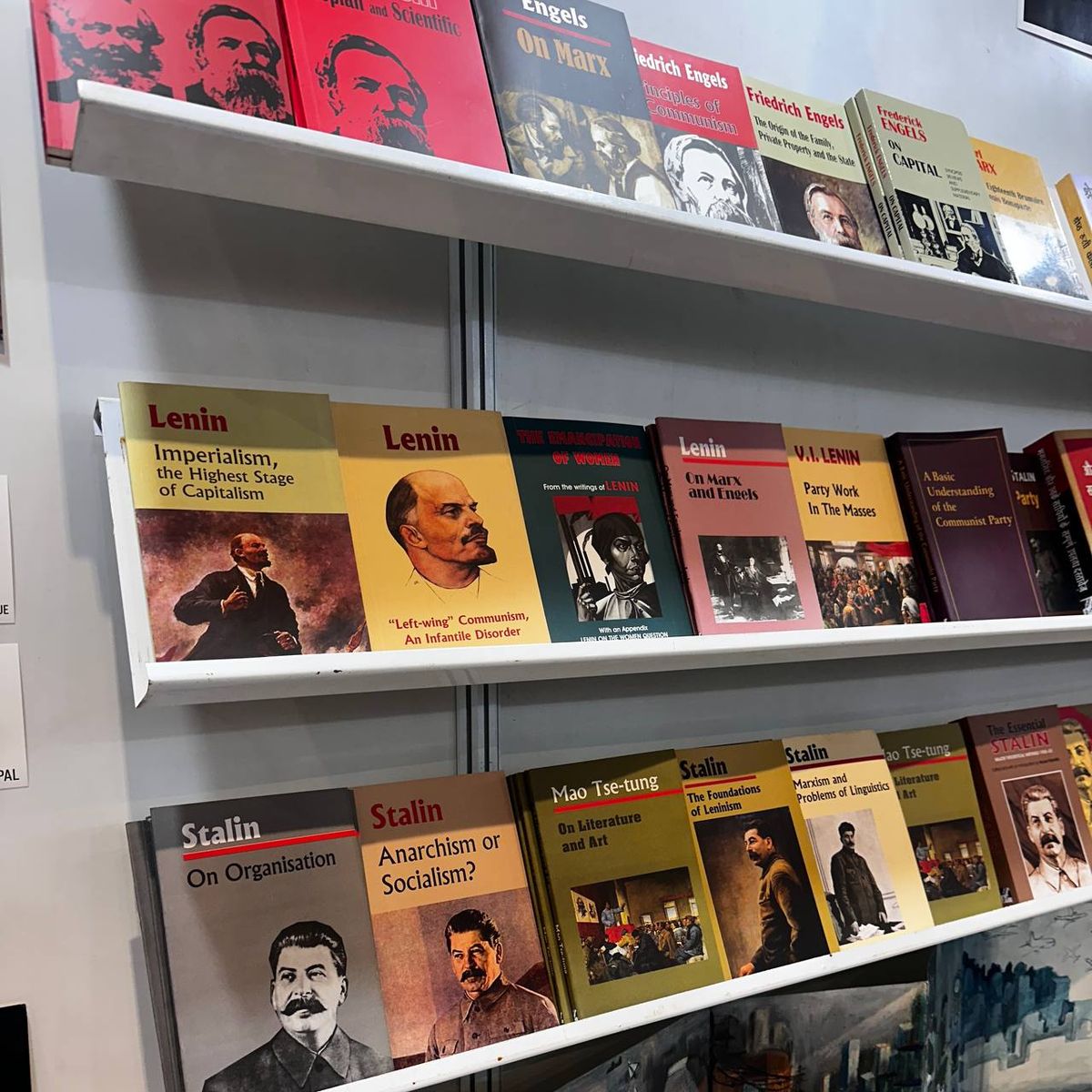 Communist literature bookshelf with Lenin and Marx