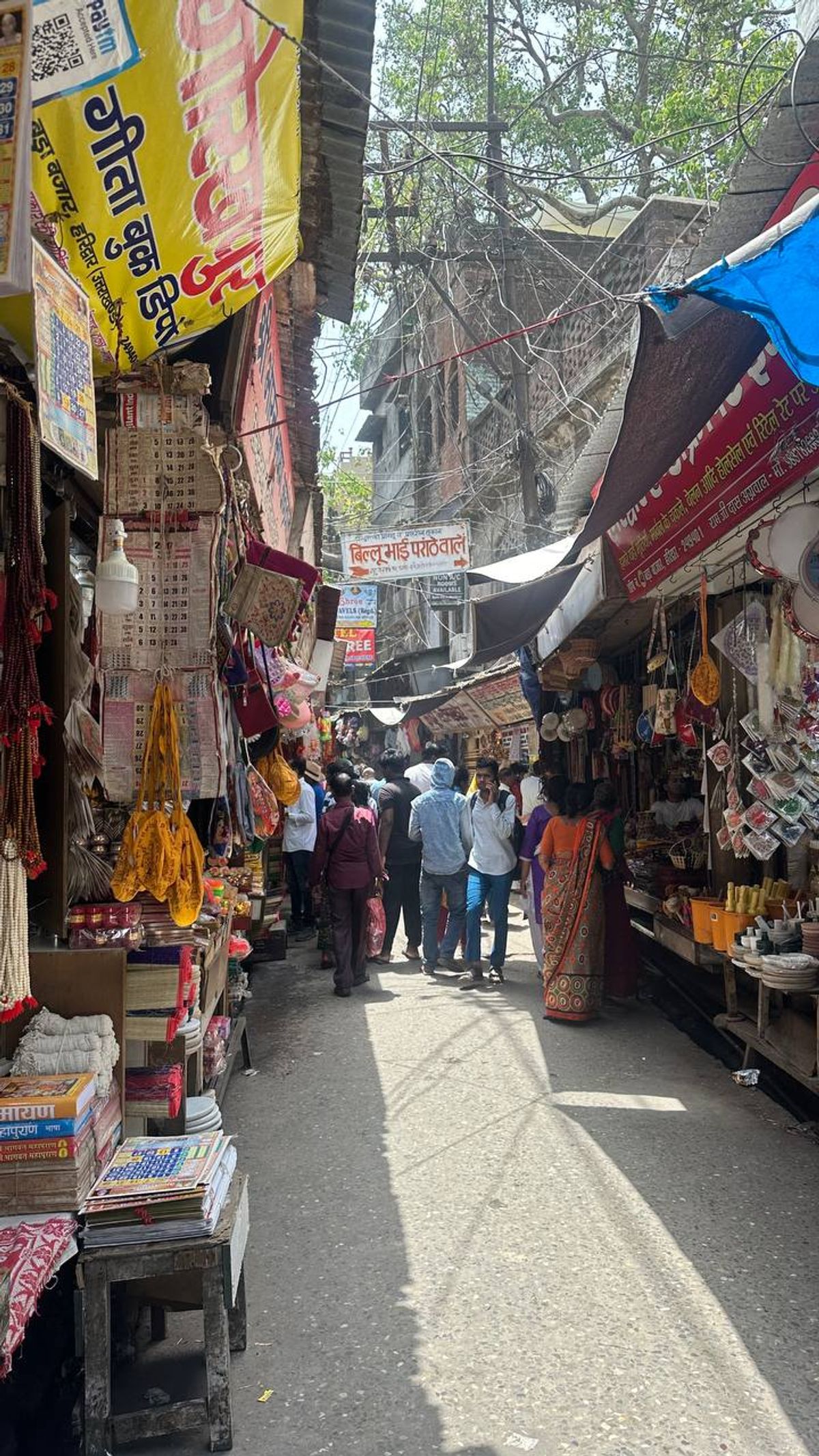 Crowded temple market lane