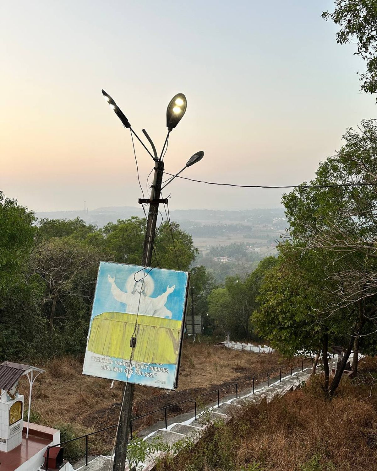 Religious sign on a hillside pilgrimage path