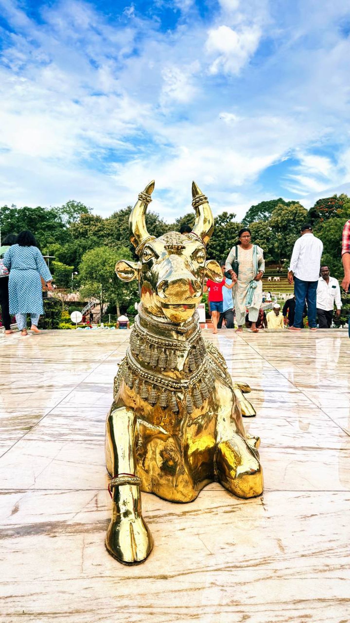 Golden Nandi statue in the ashram courtyard