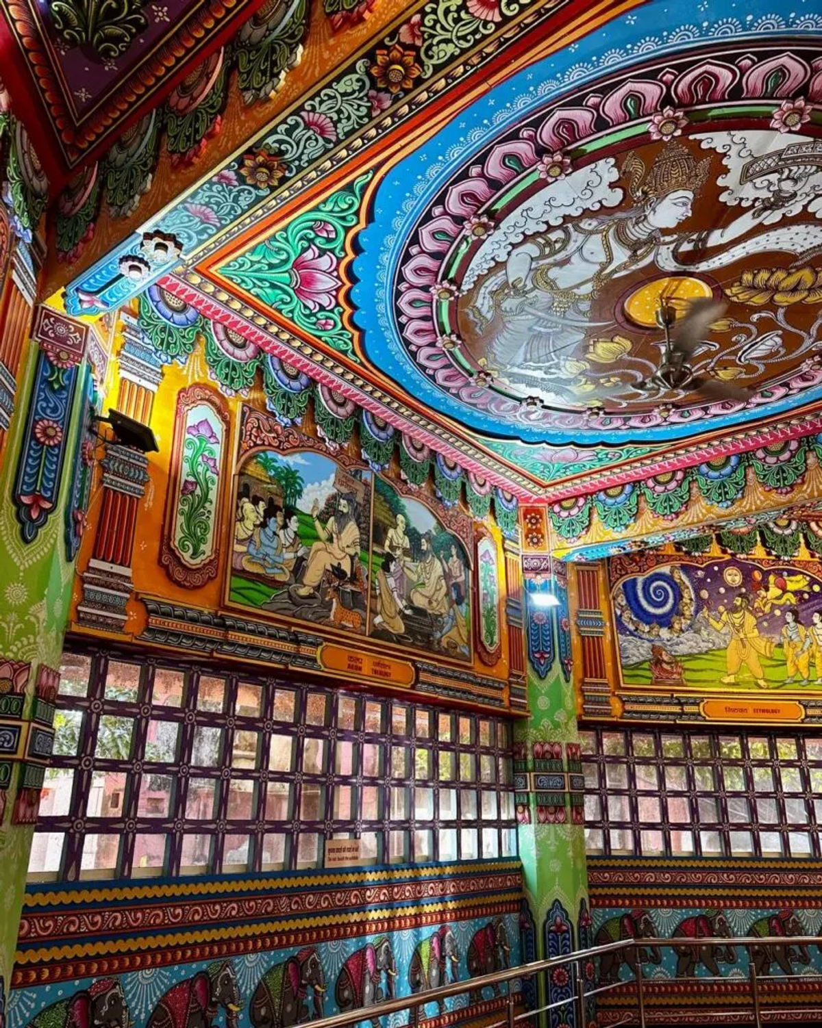 Ornate ceiling with Ganesha and decorative patterns