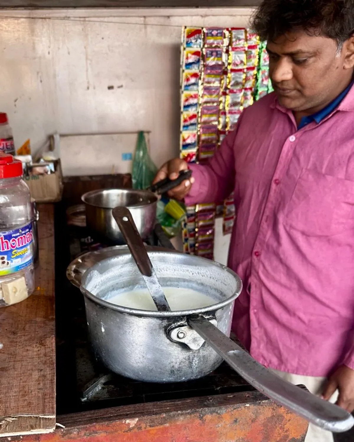 Chaiwalla preparing masala chai