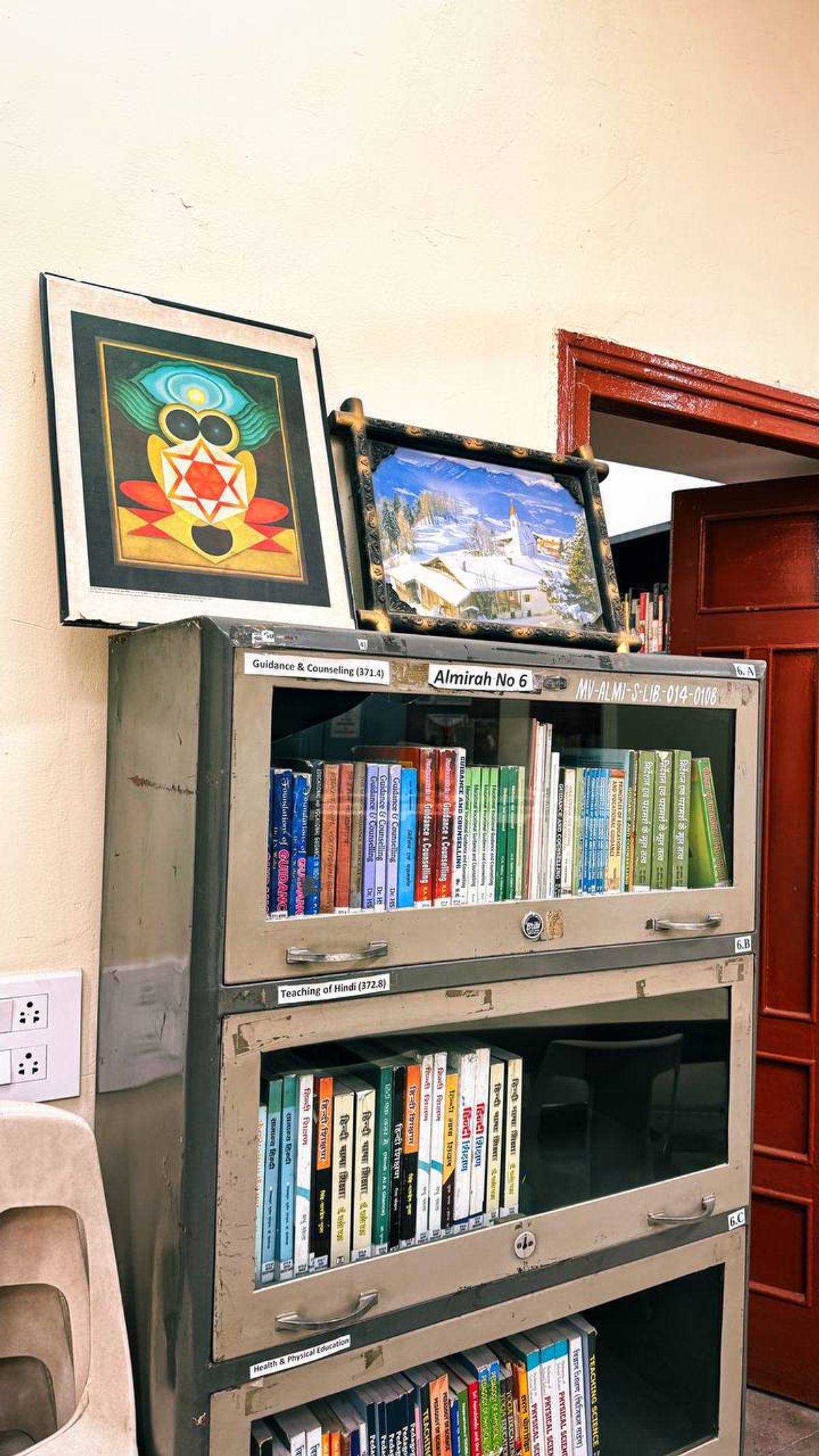 Library section with yantra artwork