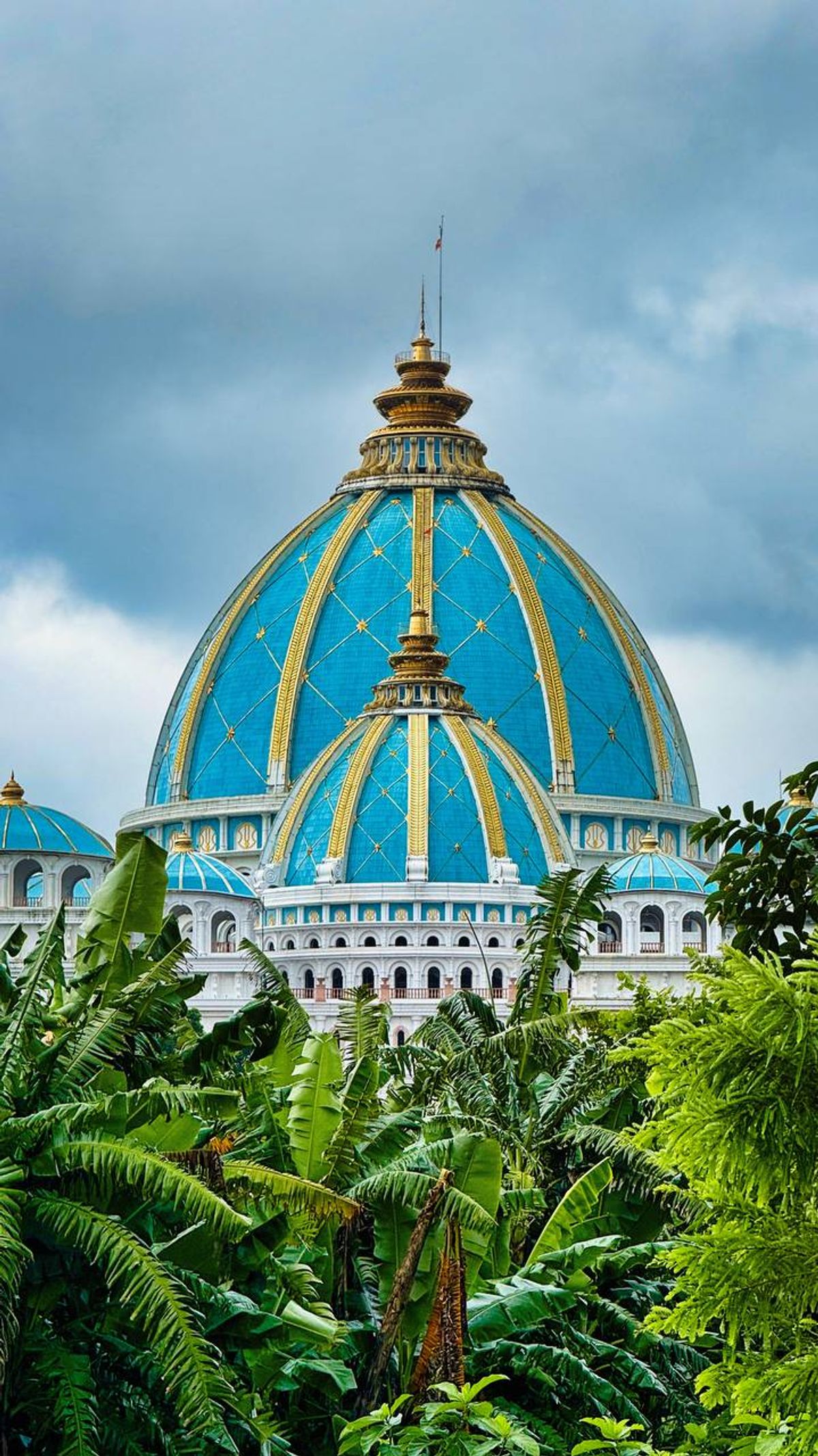 The blue and gold dome of the Temple of the Vedic Planetarium