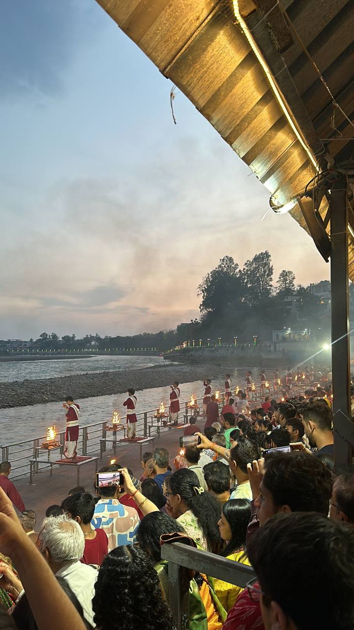 Sunset view at Triveni Ghat during Ganga Aarti ceremony