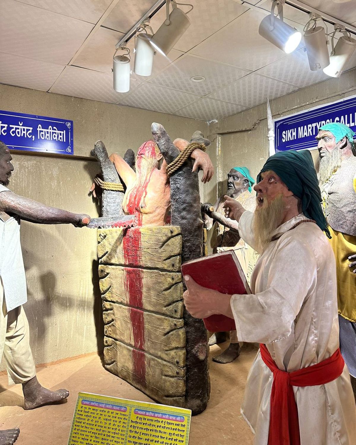 Martyrs gallery depicting Bhai Mati Das being sawn