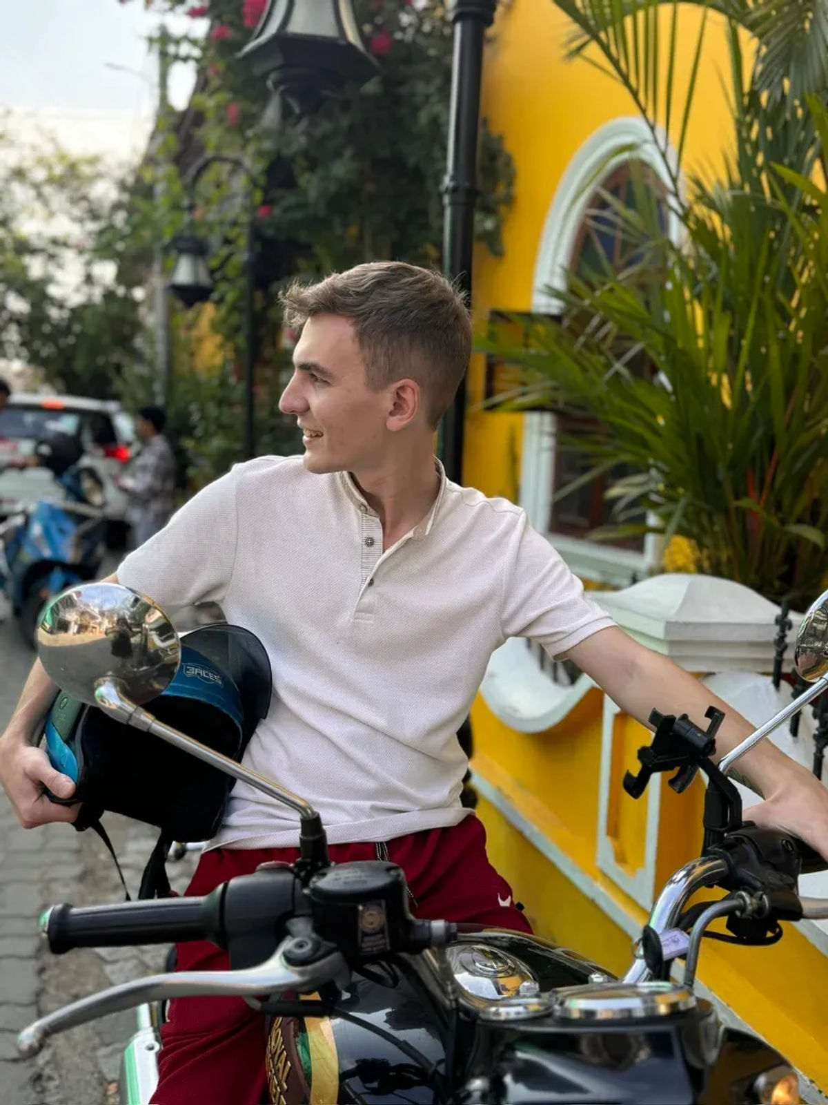 Alex on a scooter in Fort Kochi