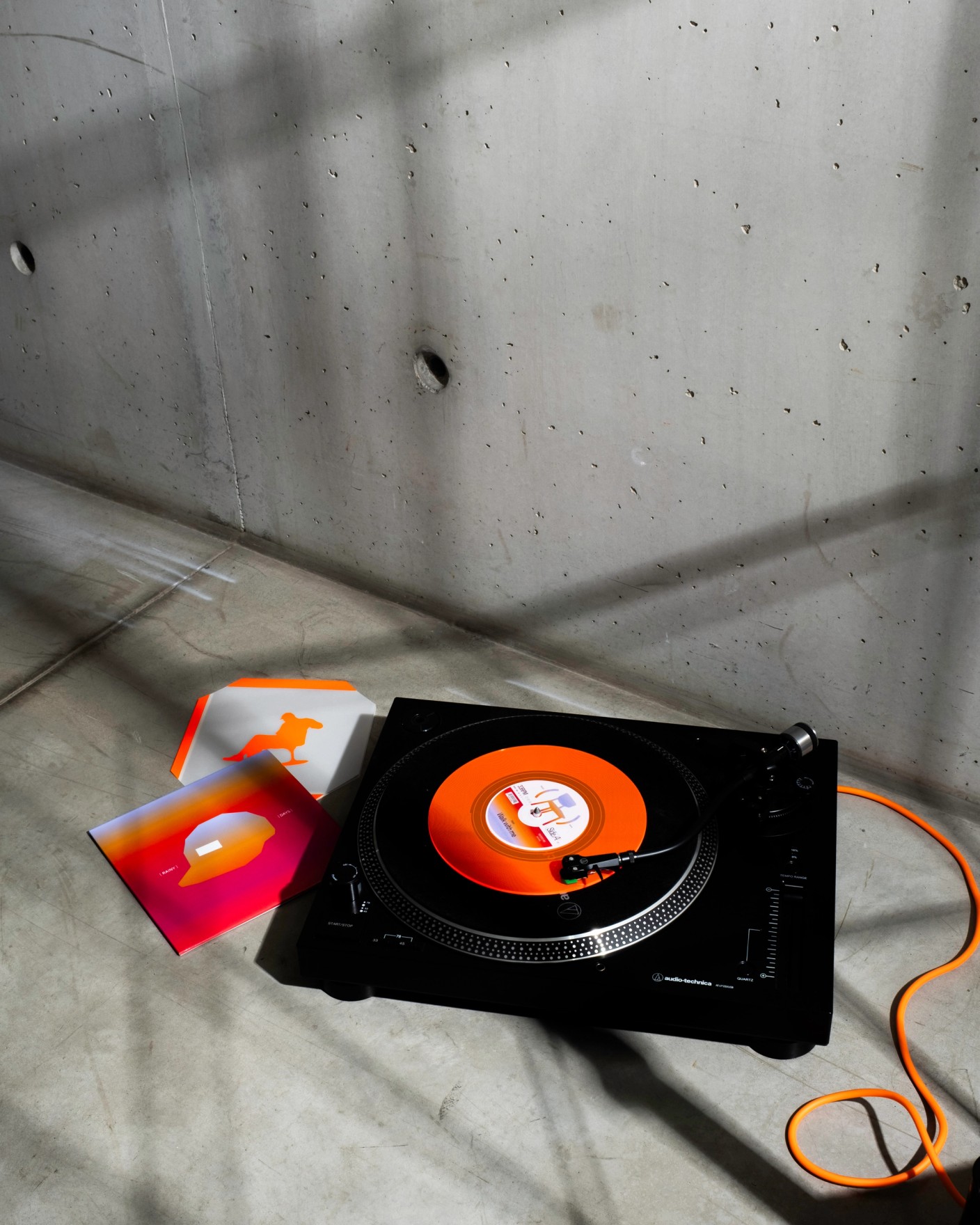 Orange WALK WITH ME record playing on a turntable