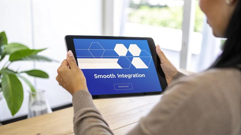 A hand sketches out a flowchart on a whiteboard, symbolizing the planning process for a smooth automation implementation.
