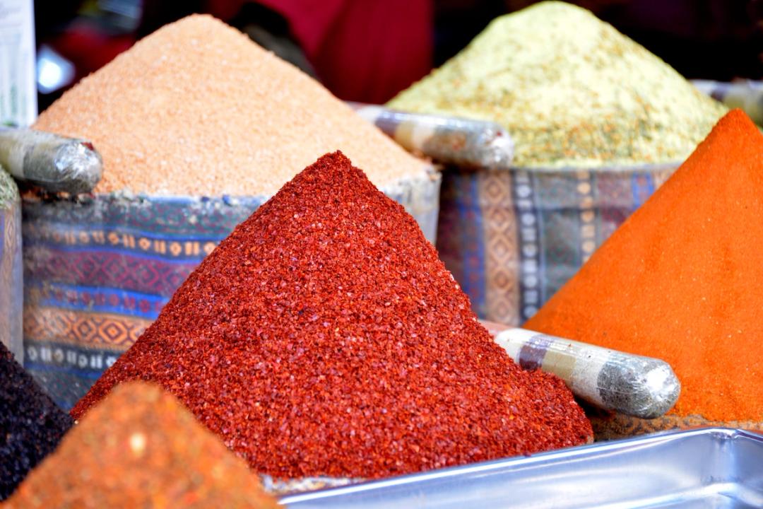 Colourful spice pyramids on display inside Istanbul's Spice Bazaar