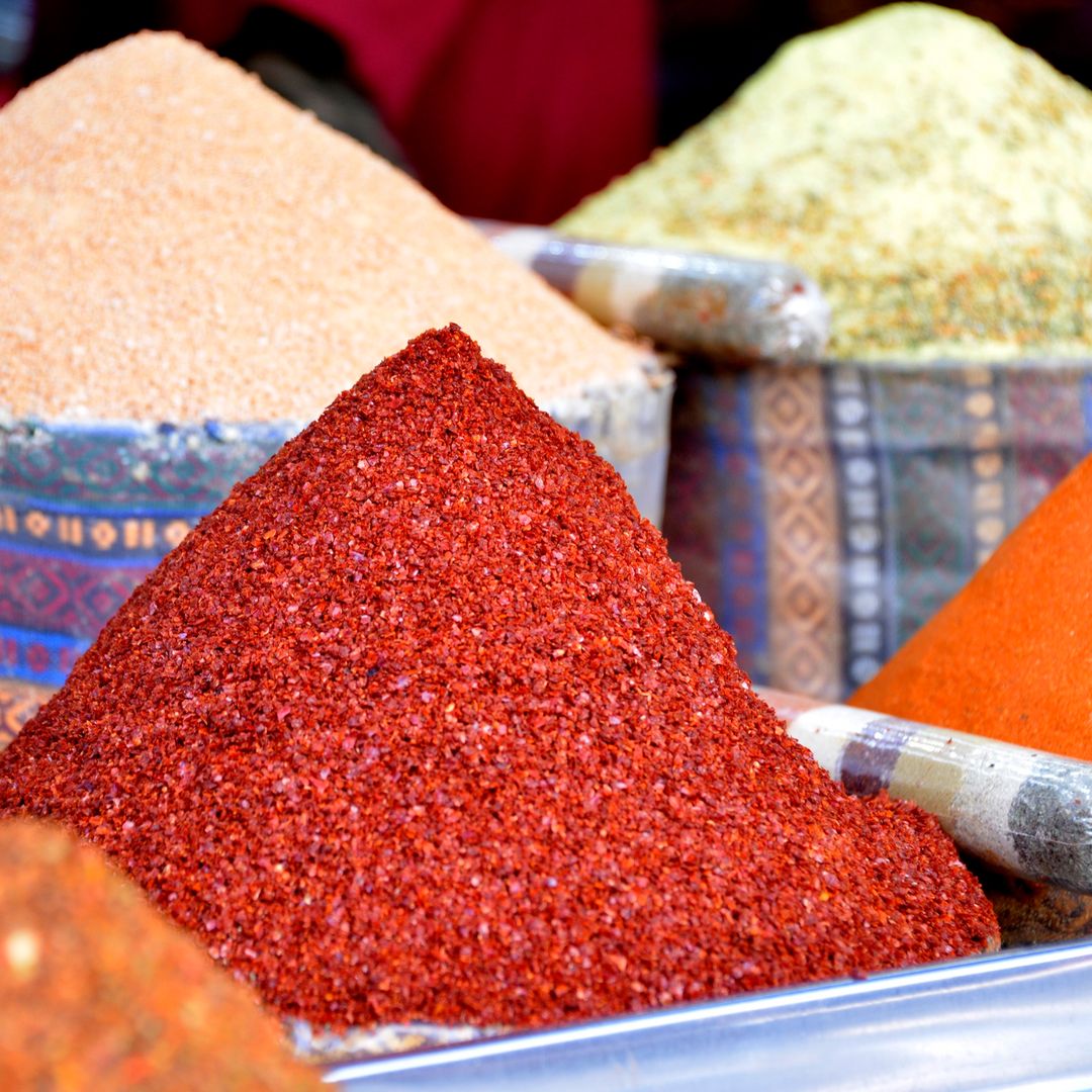 Colourful spice pyramids on display inside Istanbul's Spice Bazaar