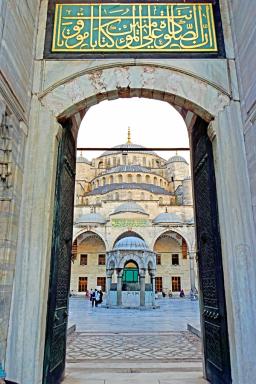 A gateway framing the Blue Mosque's domes and minarets in Istanbul's Sultanahmet