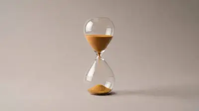 Hourglass with a small portion of sand and a faint outline in the lower chamber, showing the level it will reach.
