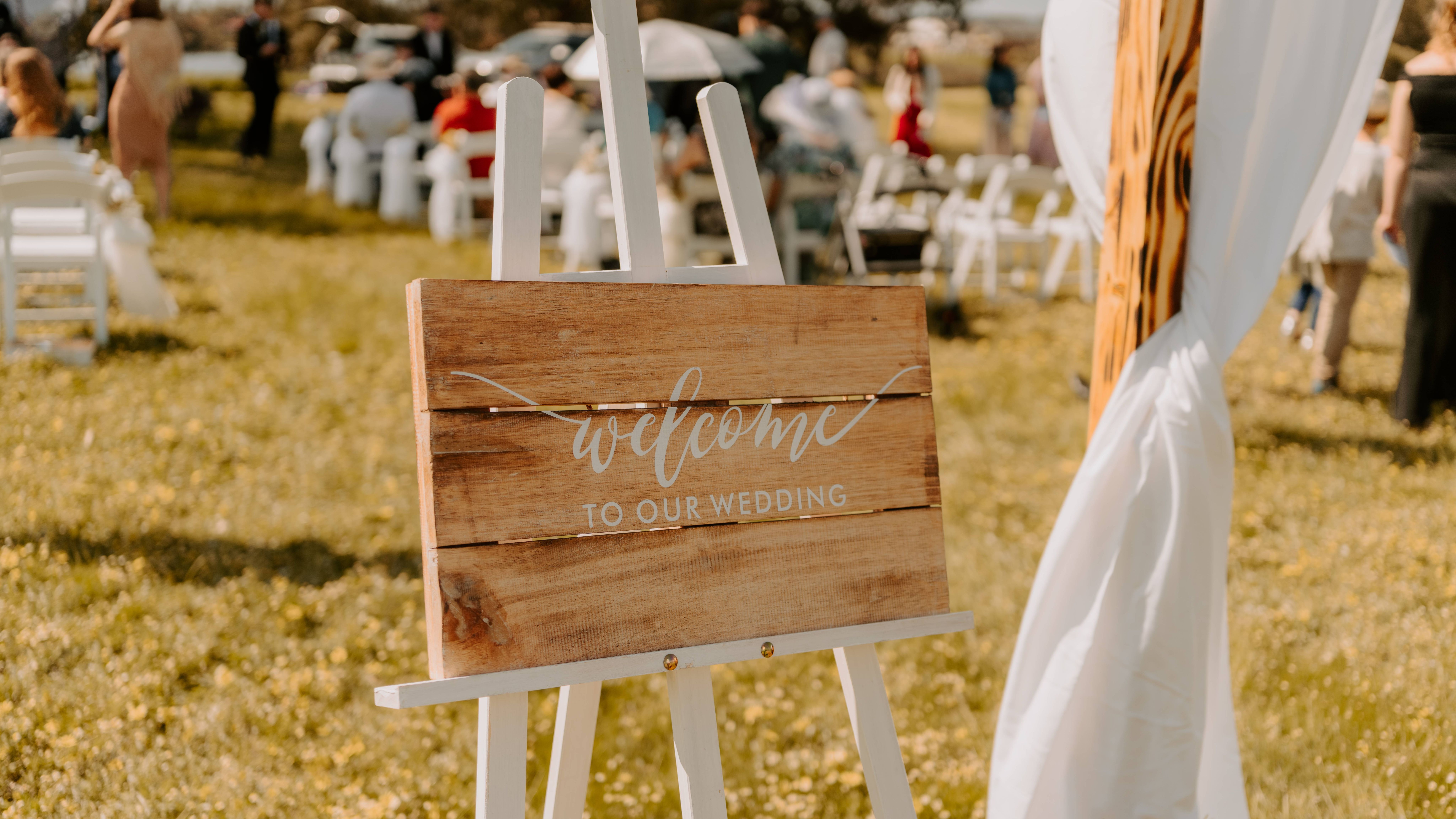 A wooden wedding postcard with text 