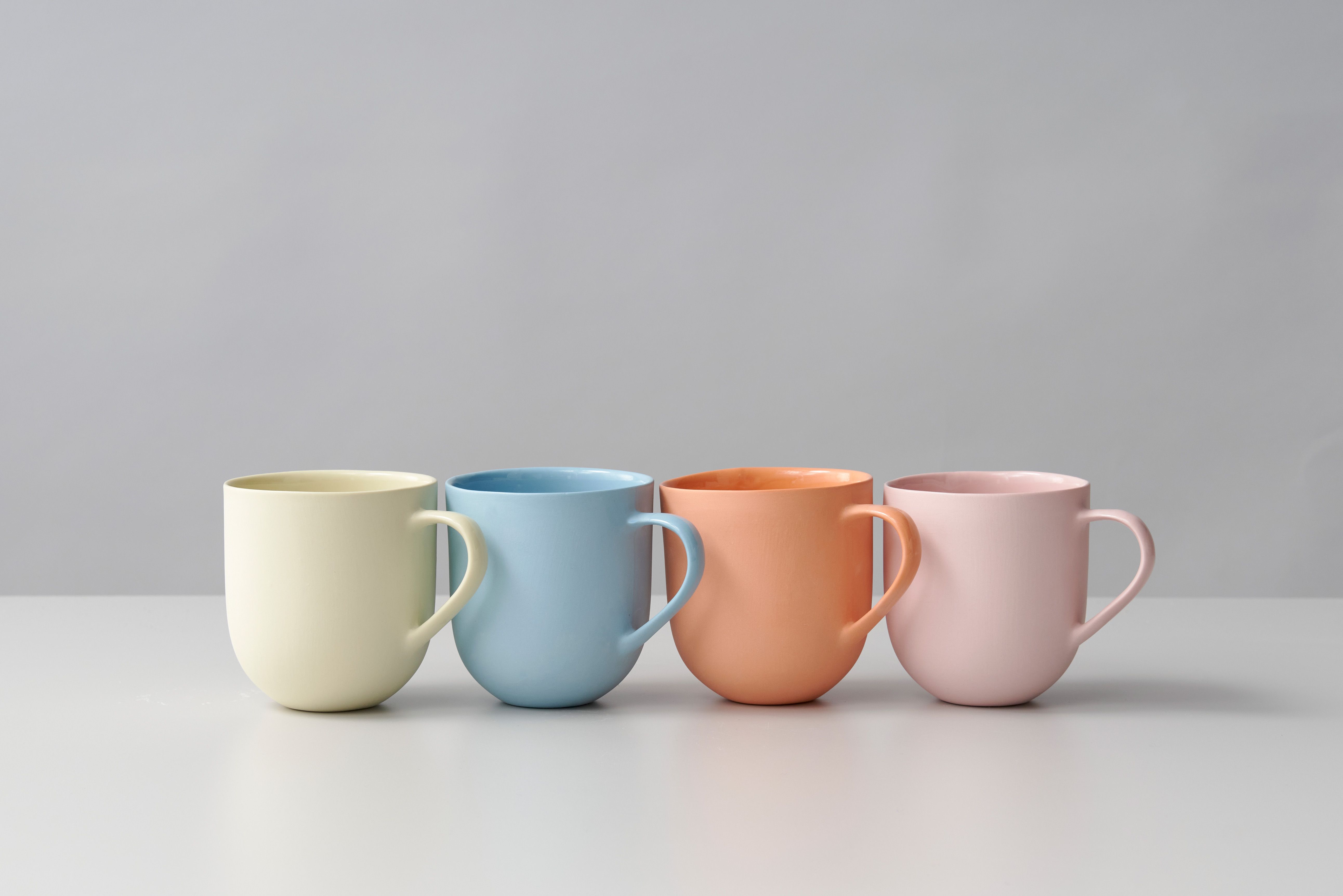 Round Ceramic Mugs