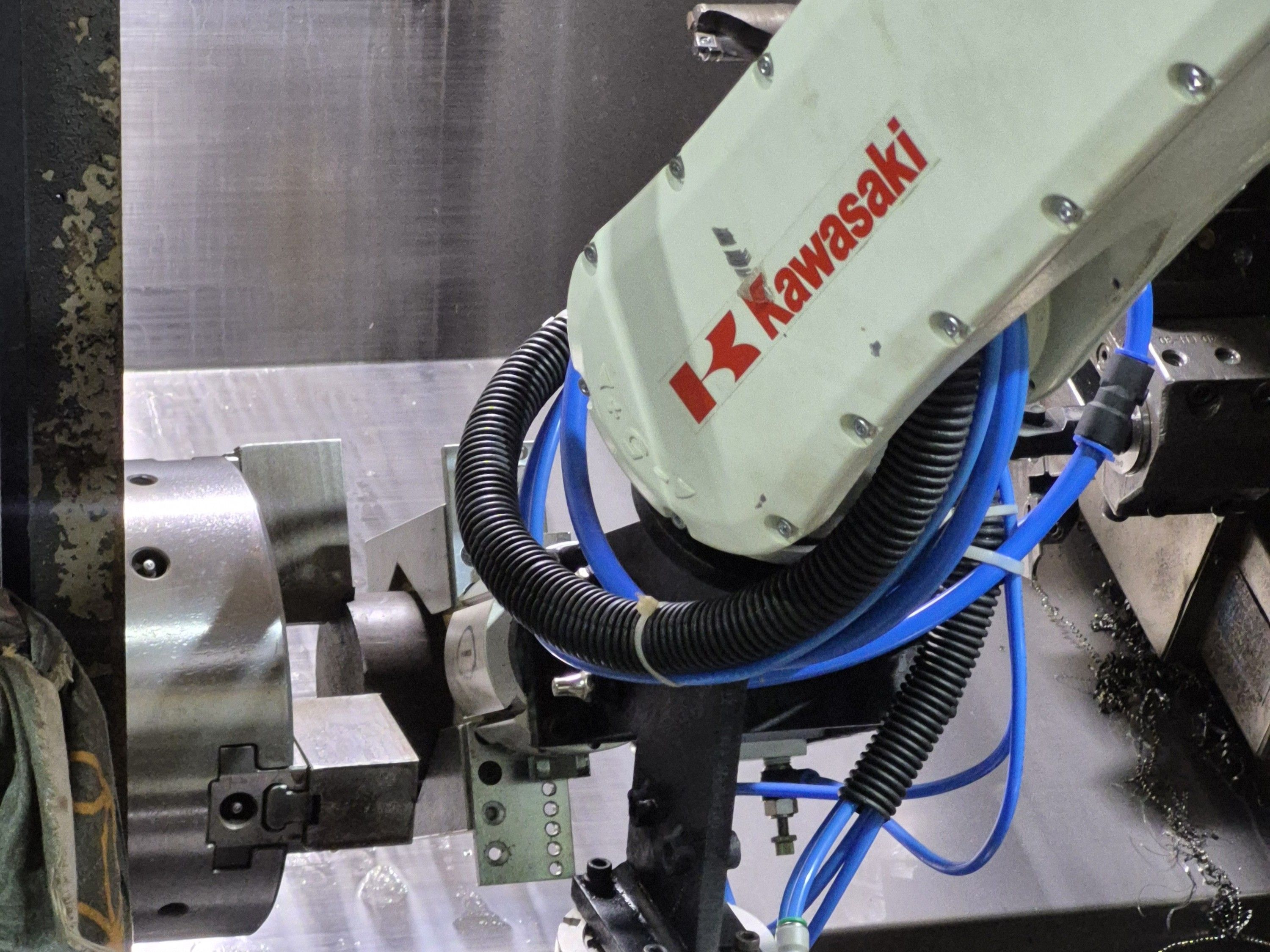 Automated Triple-CNC Tending Cell