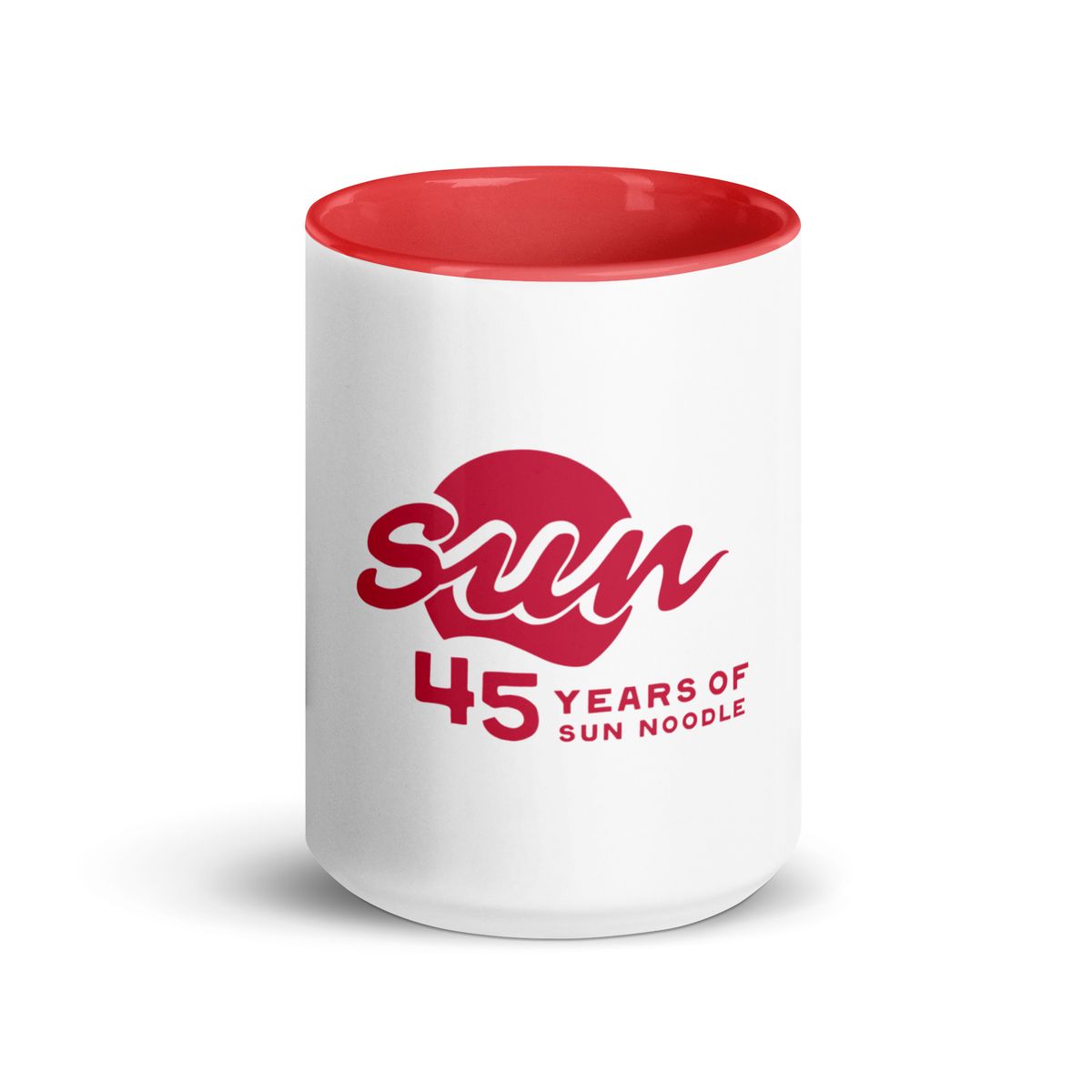 White ceramic mug with a red interior and red handle, featuring the "45 Years of Sun Noodle" logo in red, with a stylized "sun" script over a red circle.