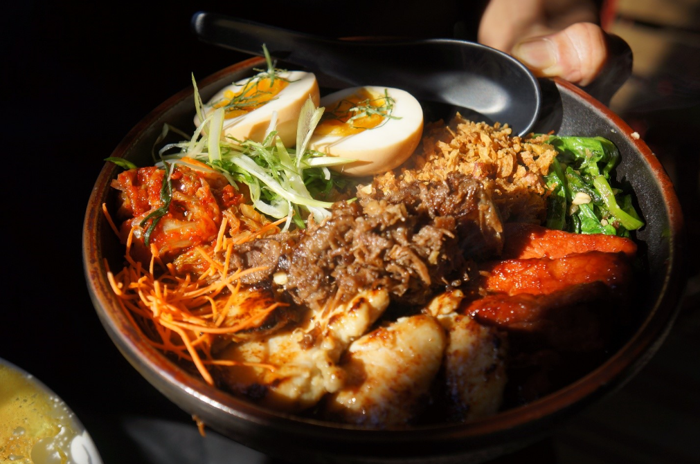 Photo of a finished dish with colorful toppings