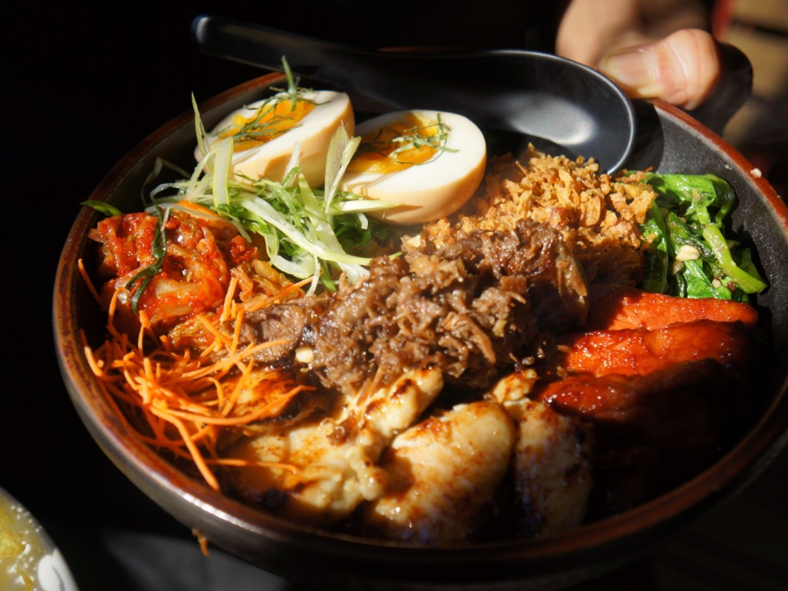 Photo of a finished dish with colorful toppings