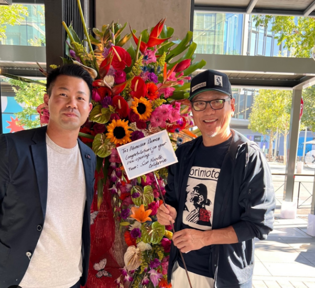 Kenshiro Uki poses with a restaurant partner