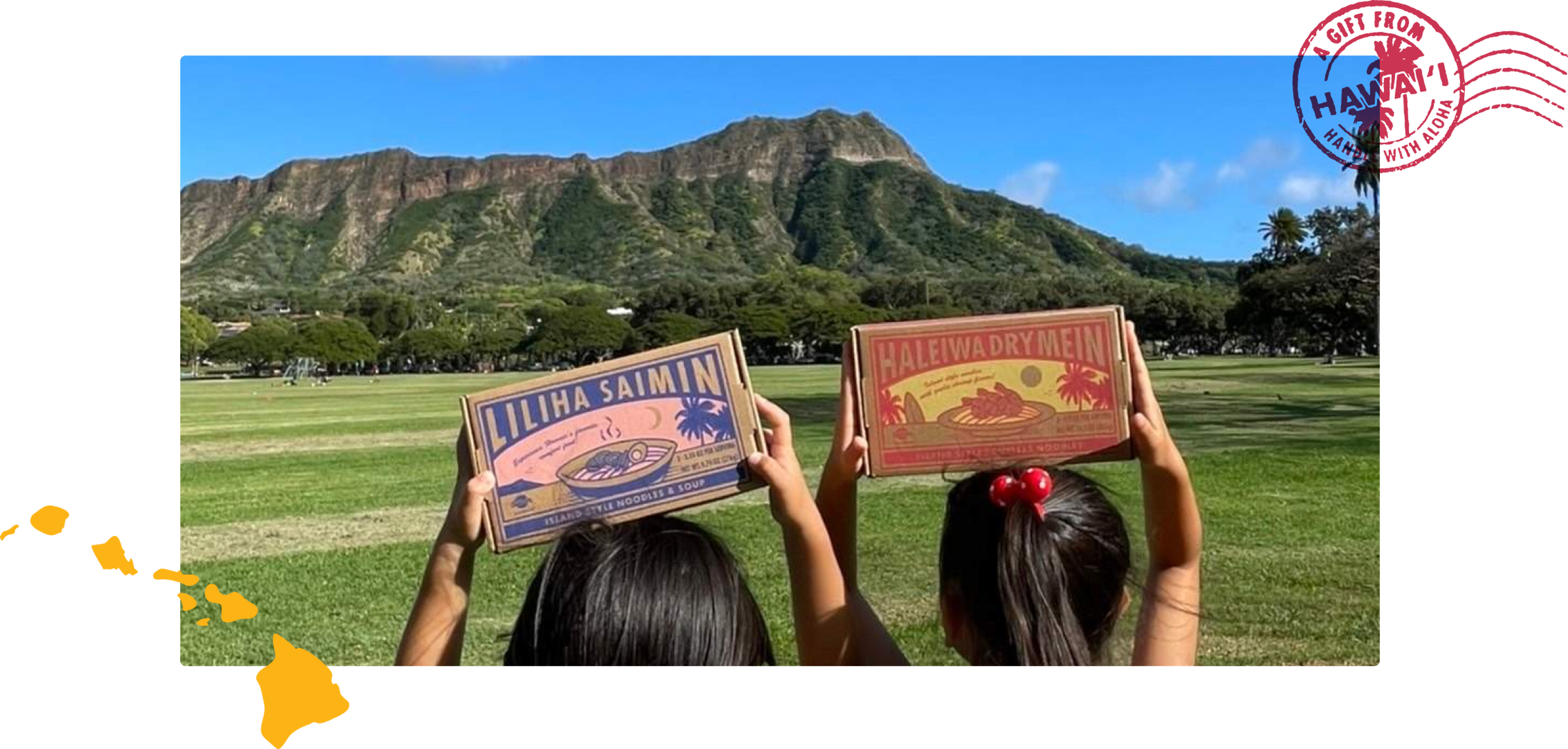 Two girls holding boxes of Liliha Saimin and Haleiwa Drymein with a postage stamp and an illustration of the island of hawaii