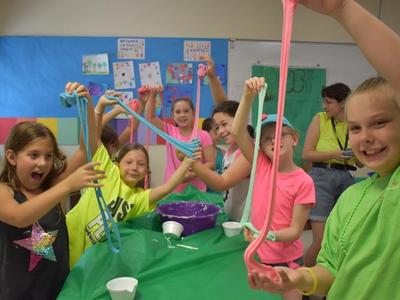 kids having fun with goop and slime at Rambling Pines Day Camp
