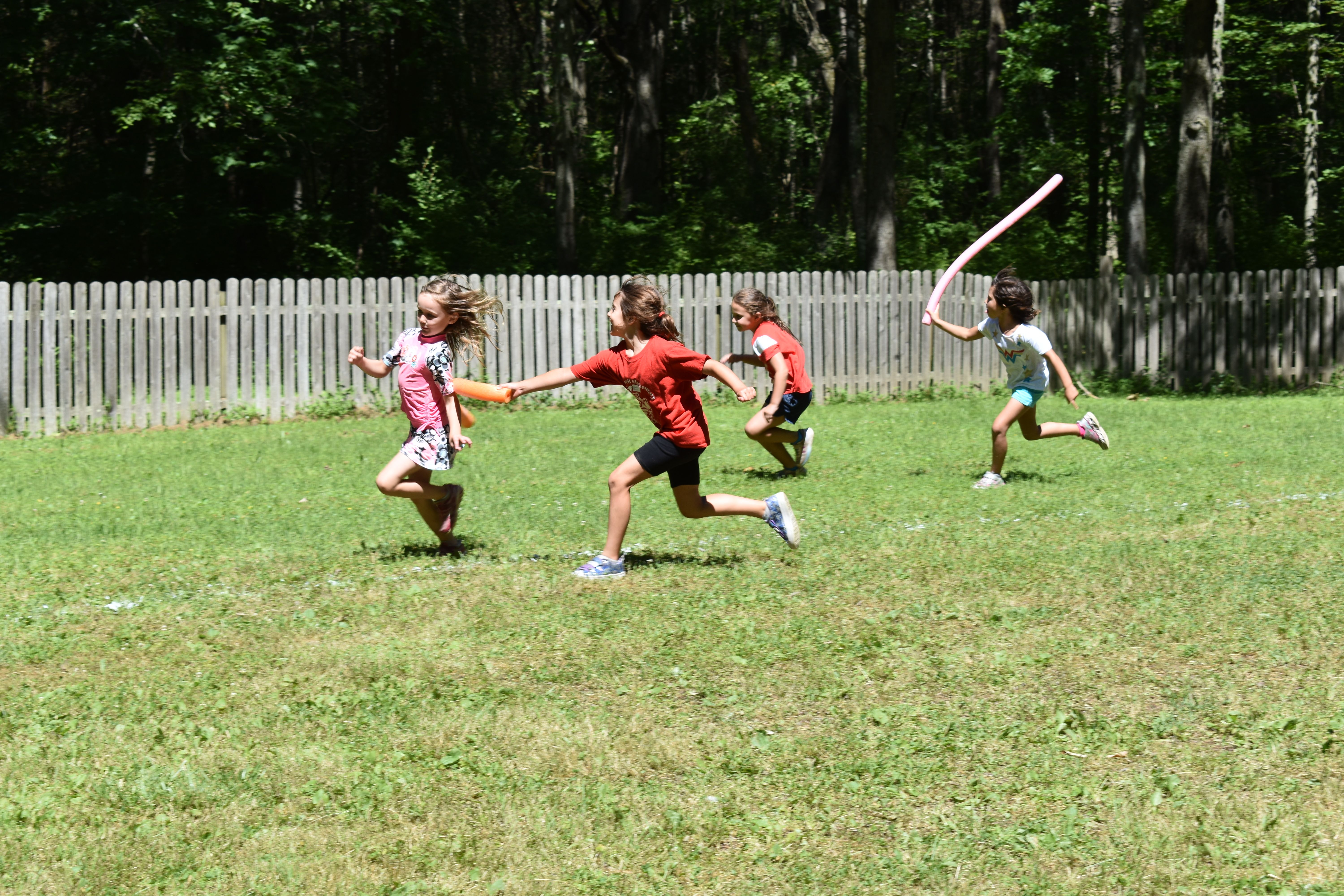 children playing tag at Rambling Pines Day Camp