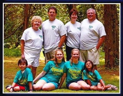 The Jordan Family posing as a group wearing Rambling Pines Day Camp T-Shirts