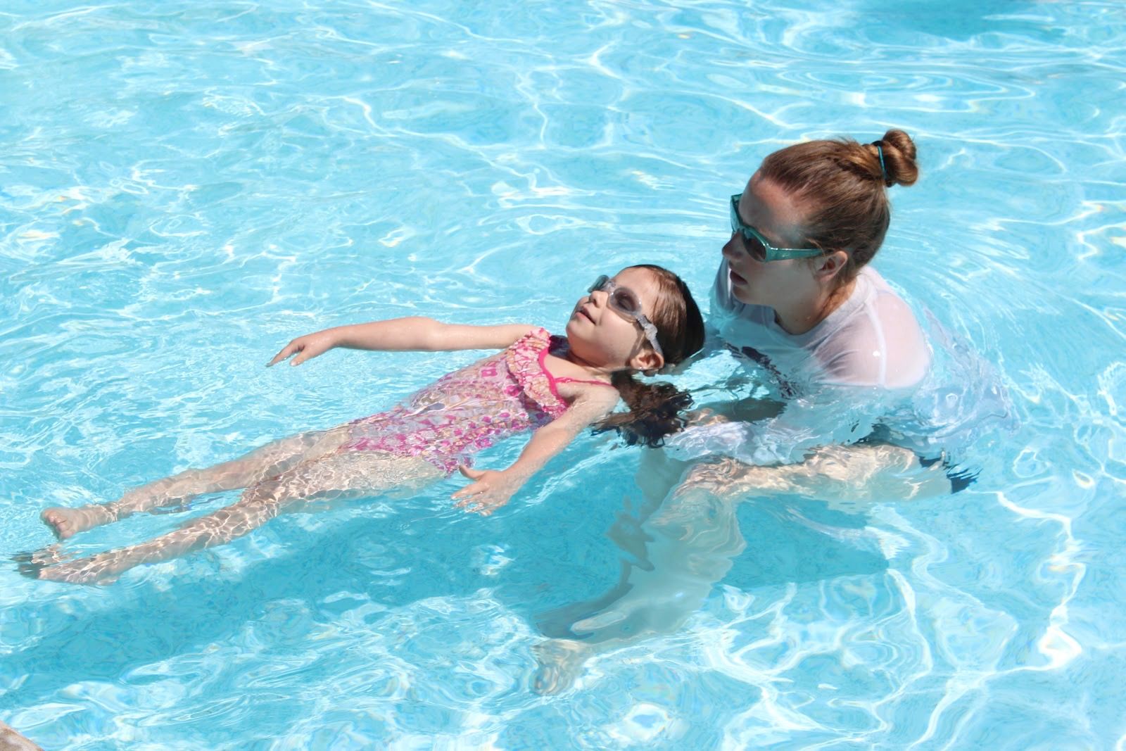 child at a swim lesson at Rambling Pines Day Camp