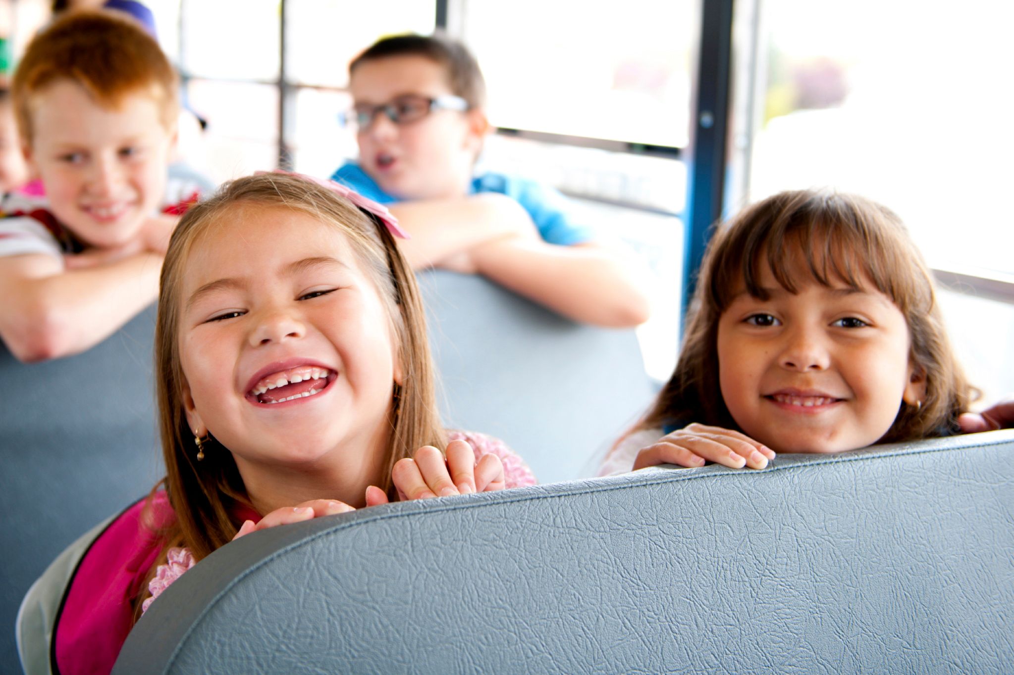 Kids on the bus to Rambling Pines Day Camp