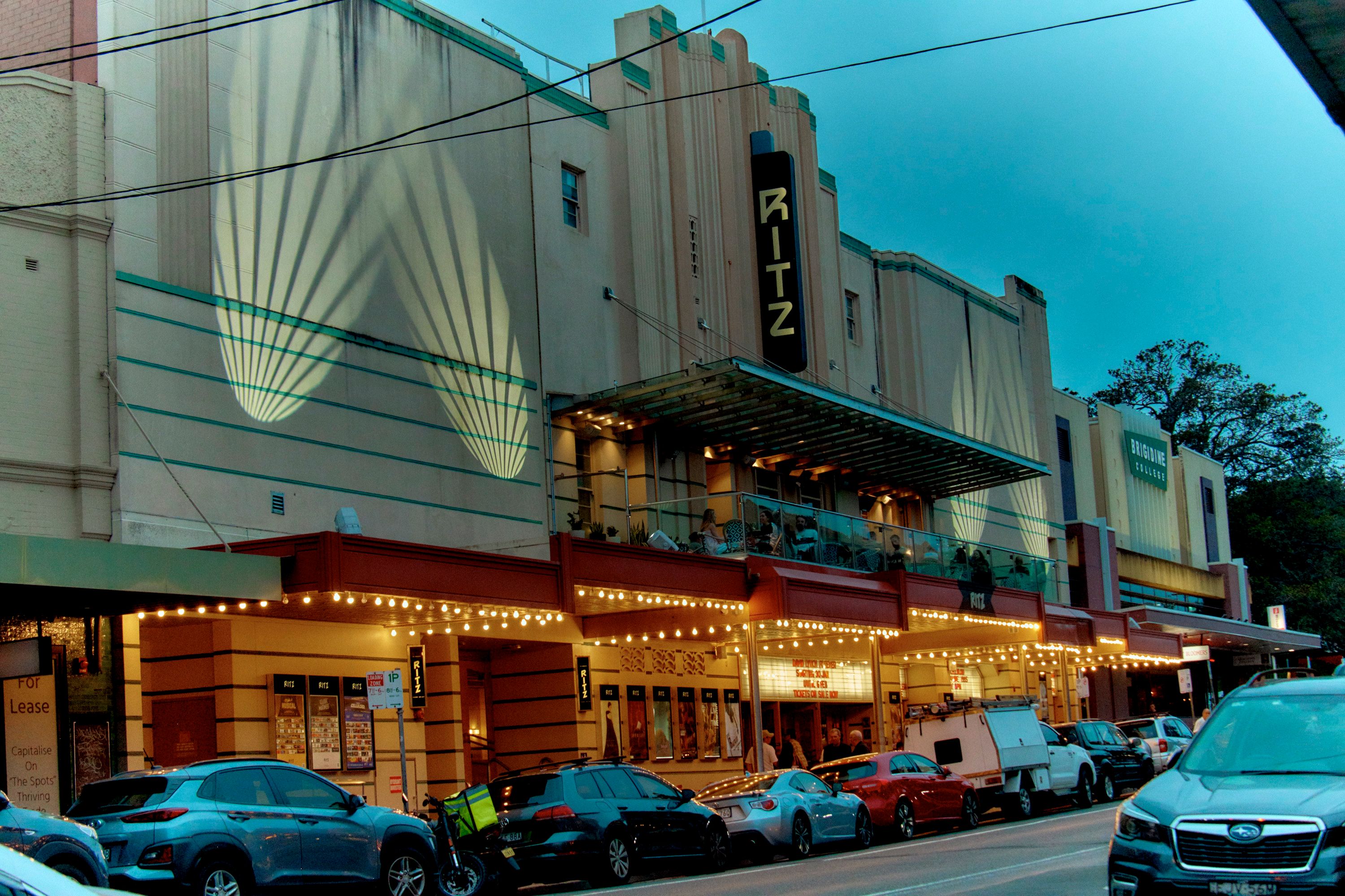 Photograph of the exterior of the art deco Ritz Cinemas in Randwick, Sydney at dusk.