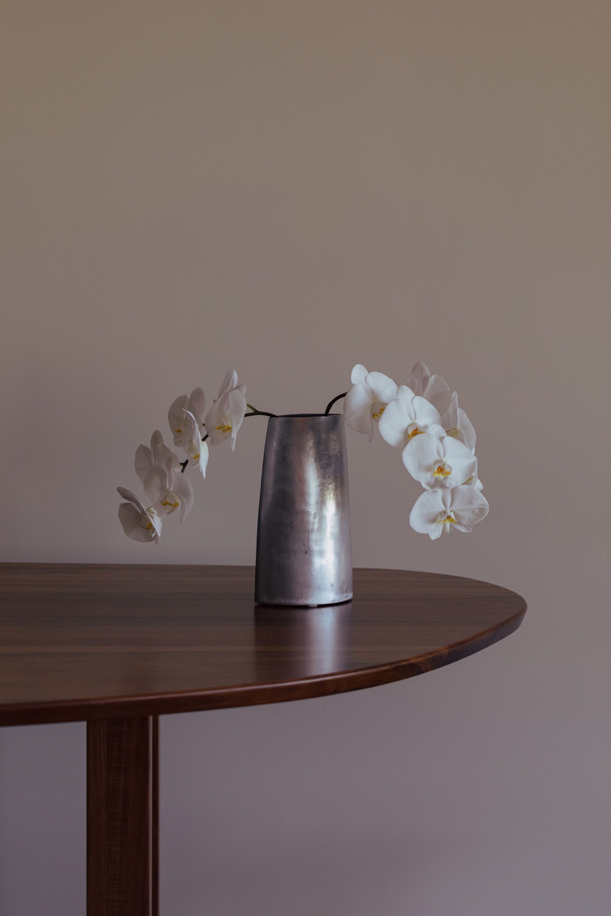 Custom timber joinery detail with concealed lighting and stone plinth — RESLU, Adelaide