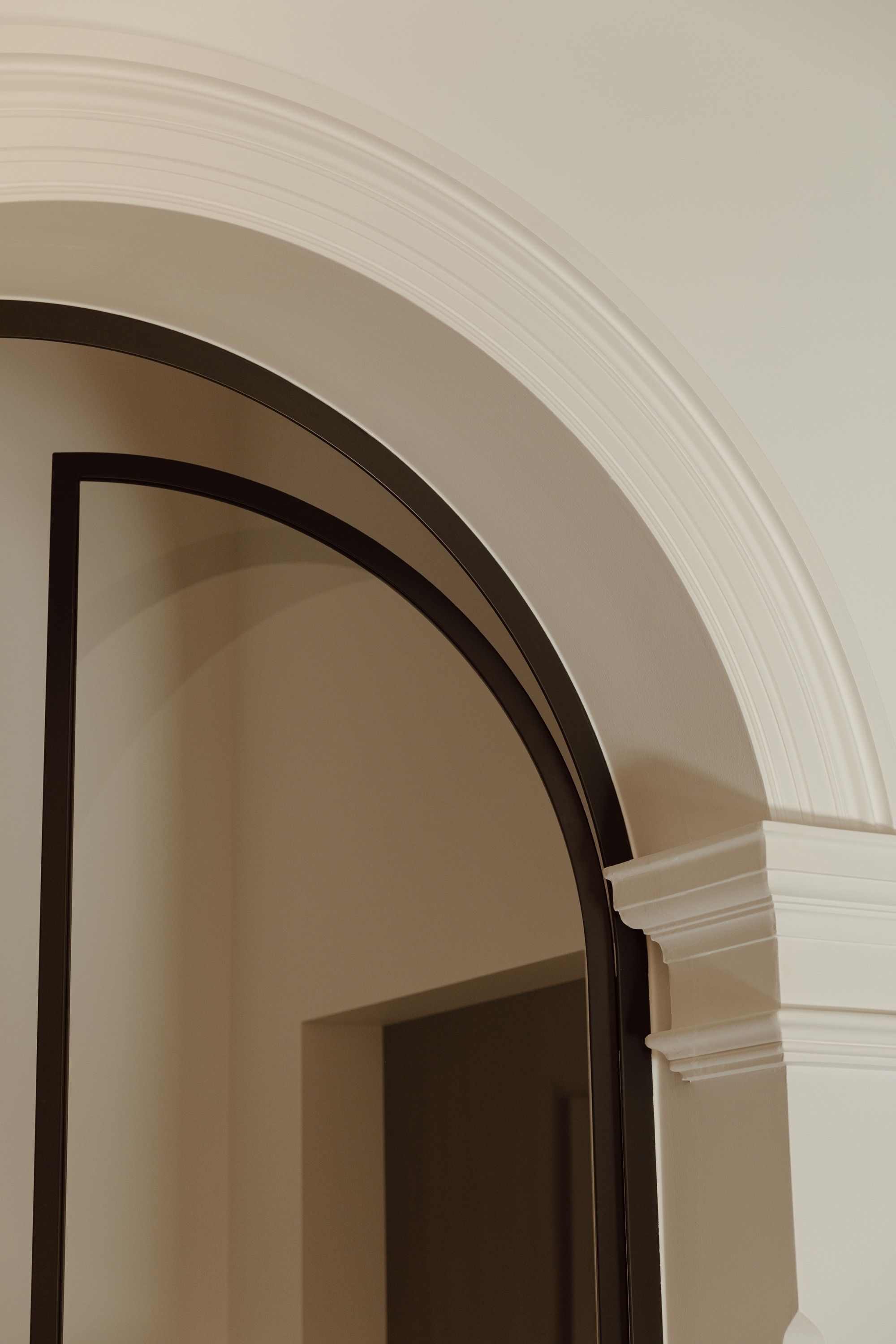 Arched doorway with steel frame and corbel detailing — RESLU, Adelaide