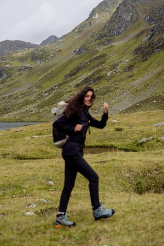 A woman wearing The North Face RMST Nuptse Jacket