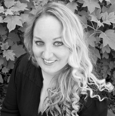 A black and white headshot on Tori Sharpe