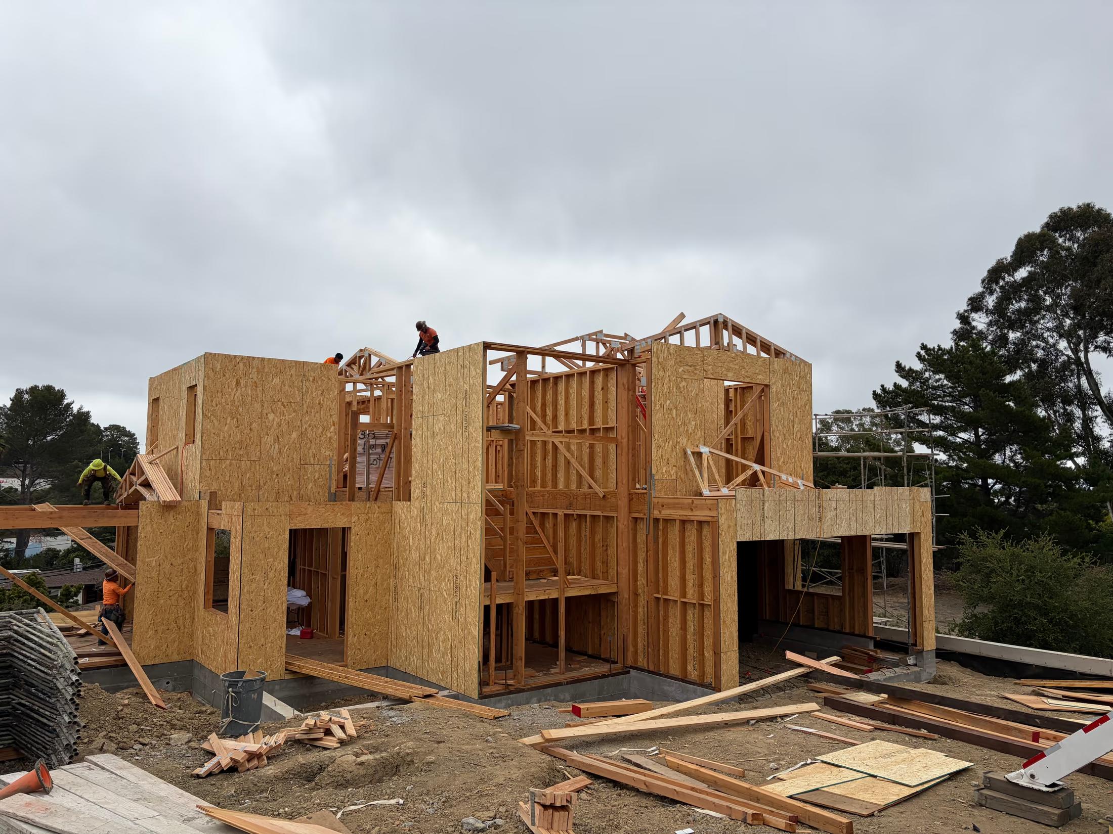 Second floor framed, first trusses going up