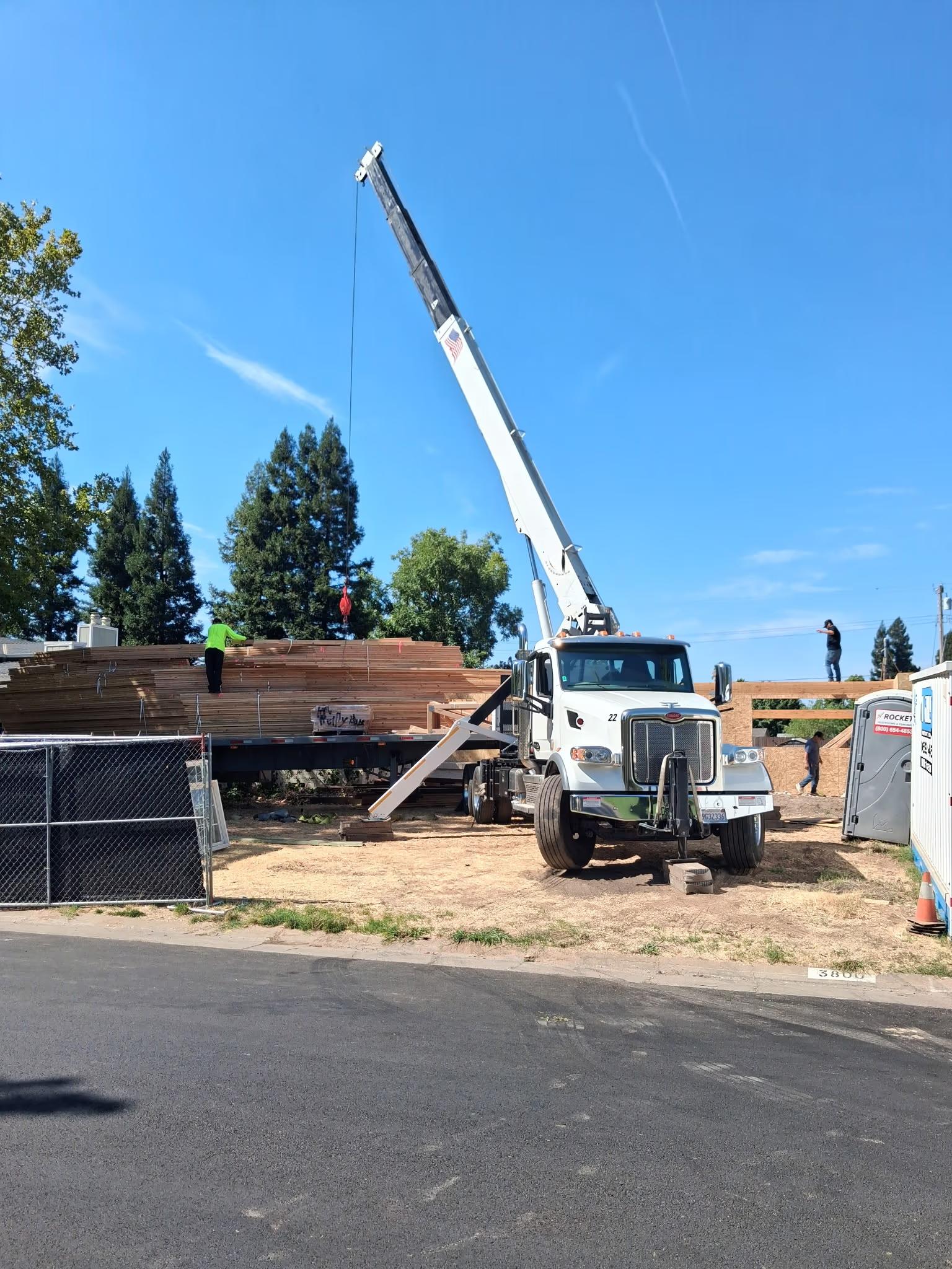 Truss package arriving on the Walker crane truck
