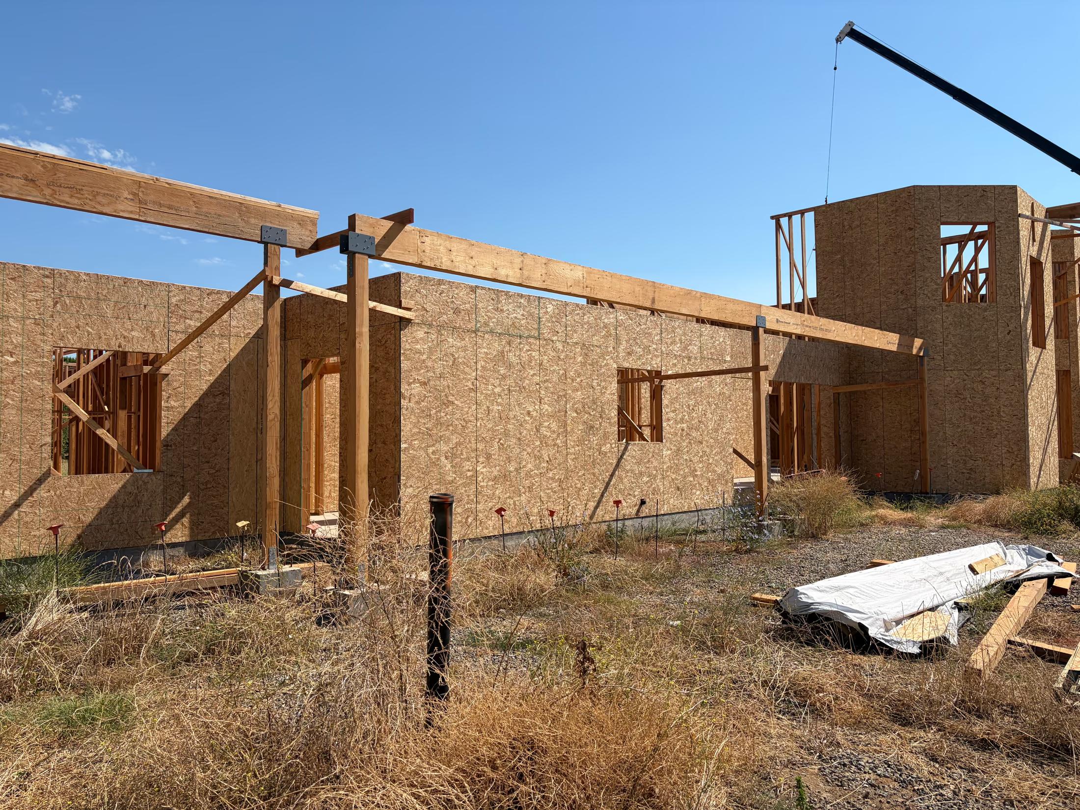 Two-story walls framed and ready for the roof
