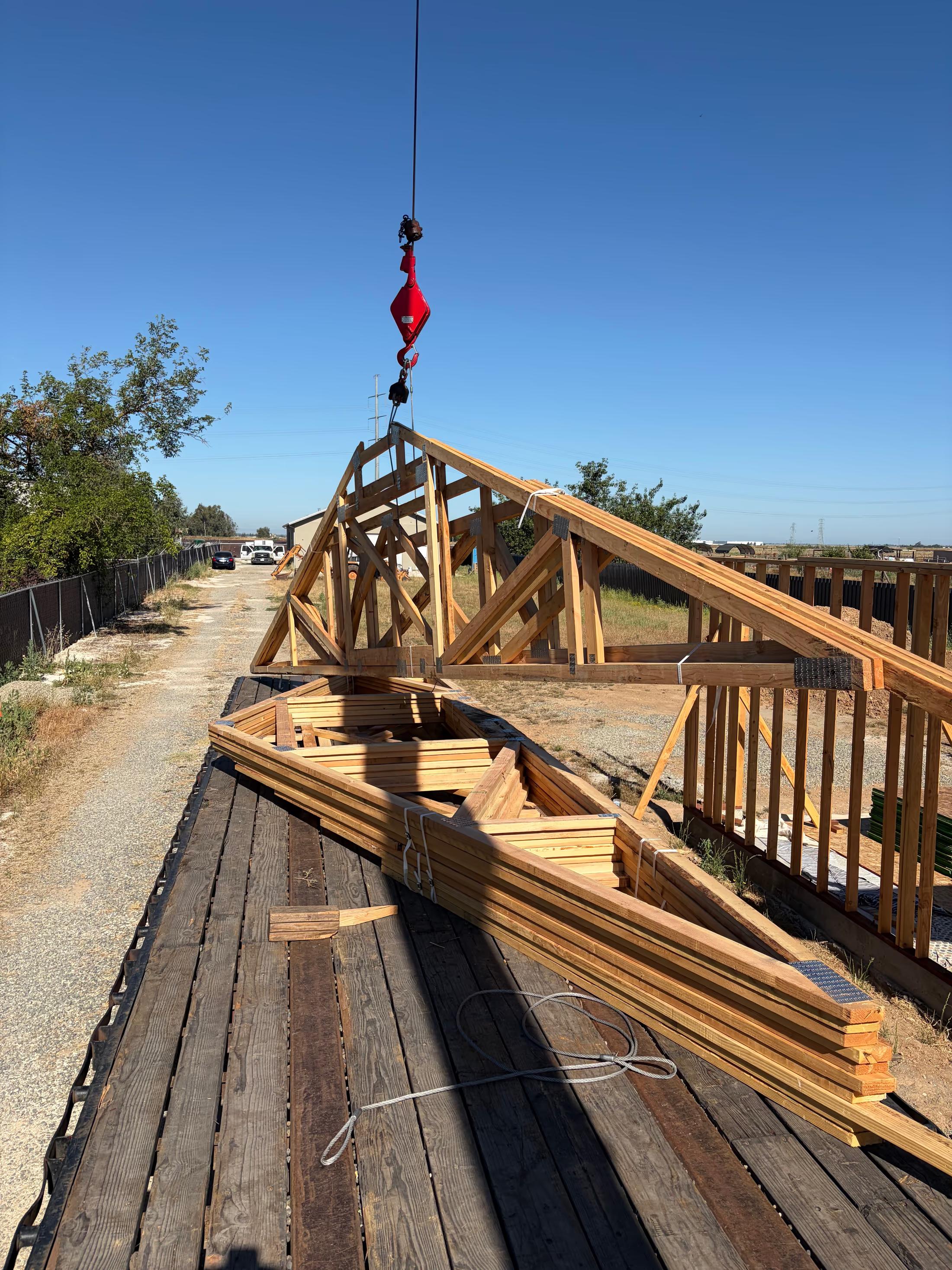 Roof trusses being craned into place