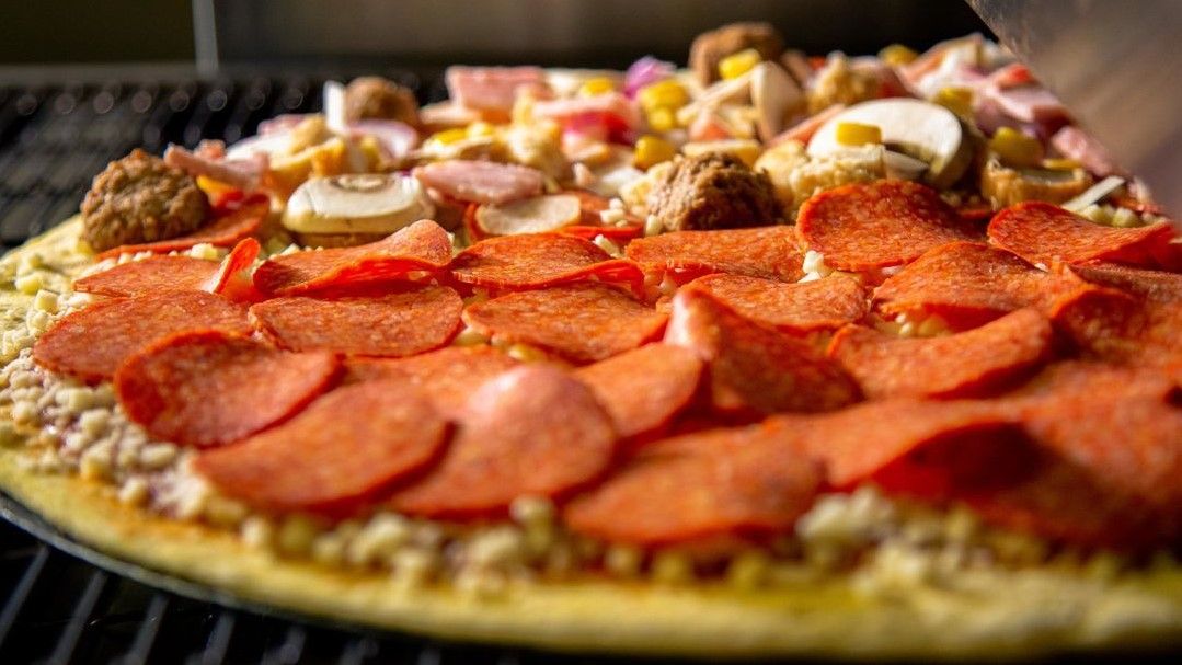 Pizza Max. Delivered by Just Eat.