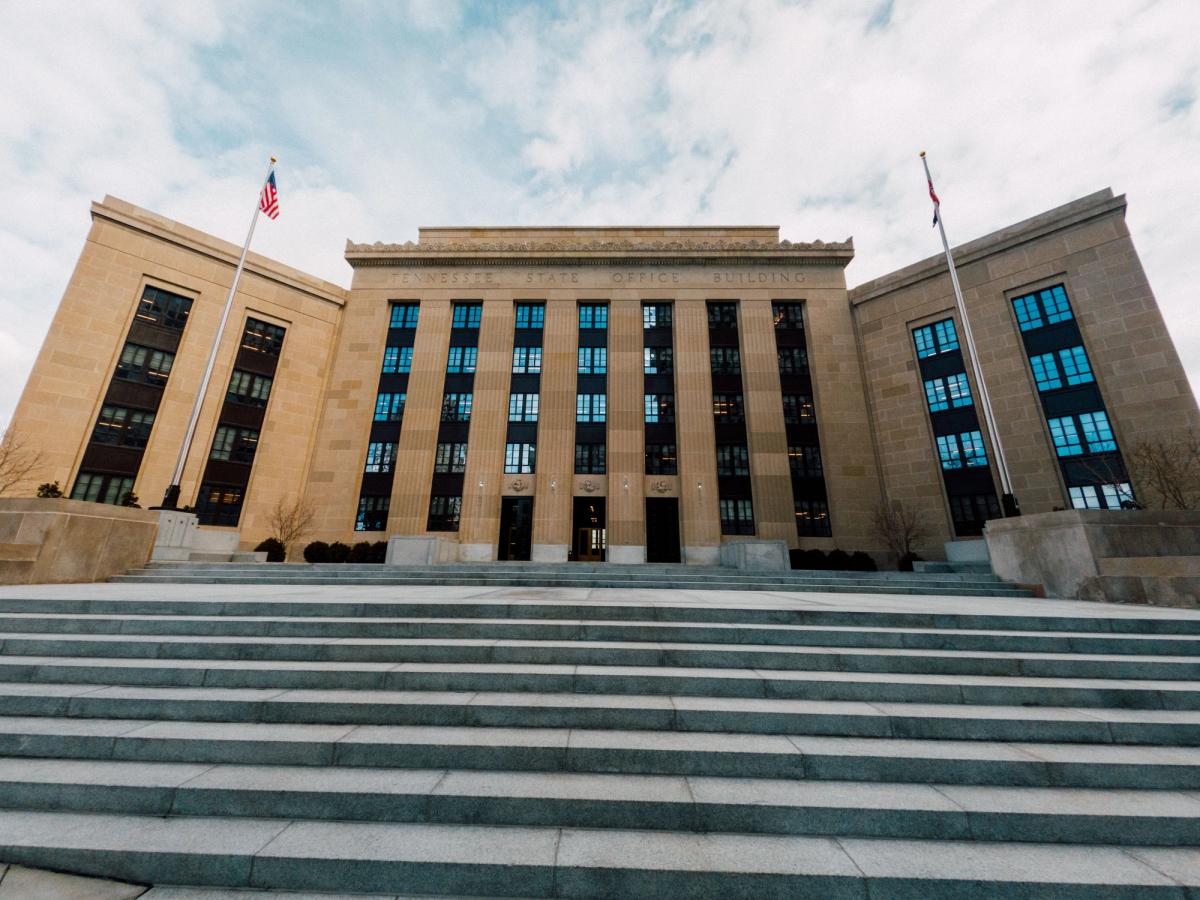 Kevin Warsh holds rates in his first Federal Reserve meeting June 17 2026 as nine officials signal a possible rate hike this year.