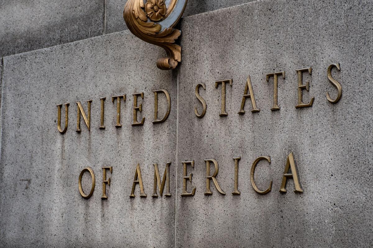 Federal Reserve building in Washington DC as June 2026 dot plot signals a possible 2026 rate hike from the FOMC.