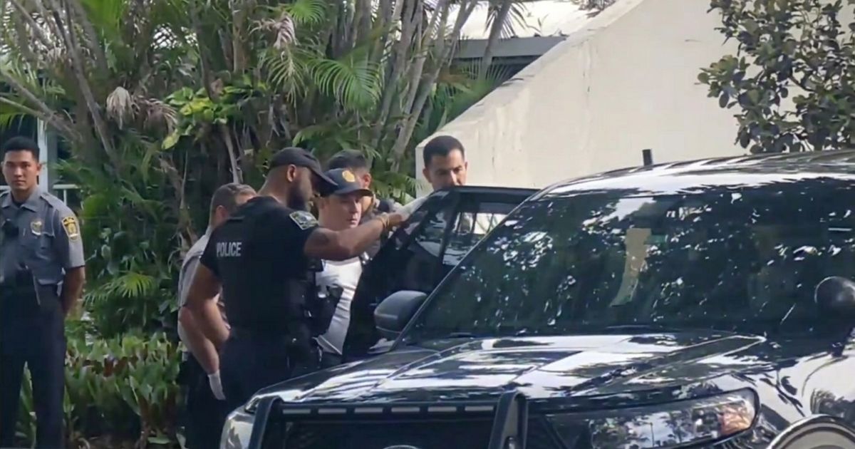 A police pursuit that began in Miramar ended in Miami Lakes, where the suspect jumped into a residential lake and hid under a dock before being taken into custody.