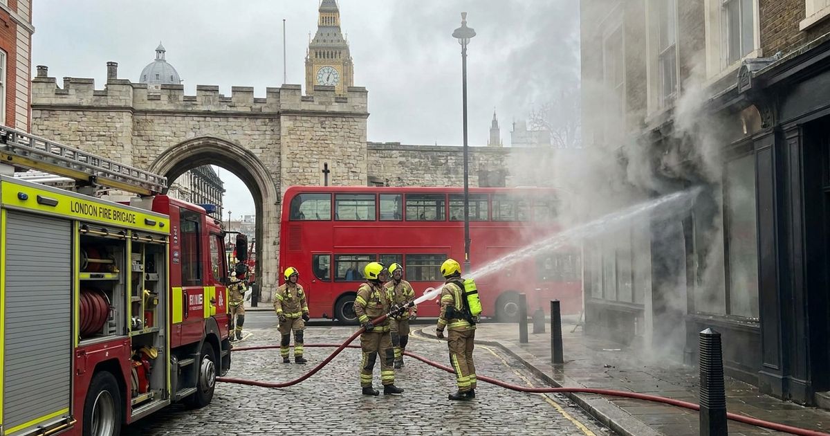 Three men died after a fire engulfed a single-storey pavilion on New Zealand Way in White City, west London, as 100 firefighters battled the blaze Saturday night.